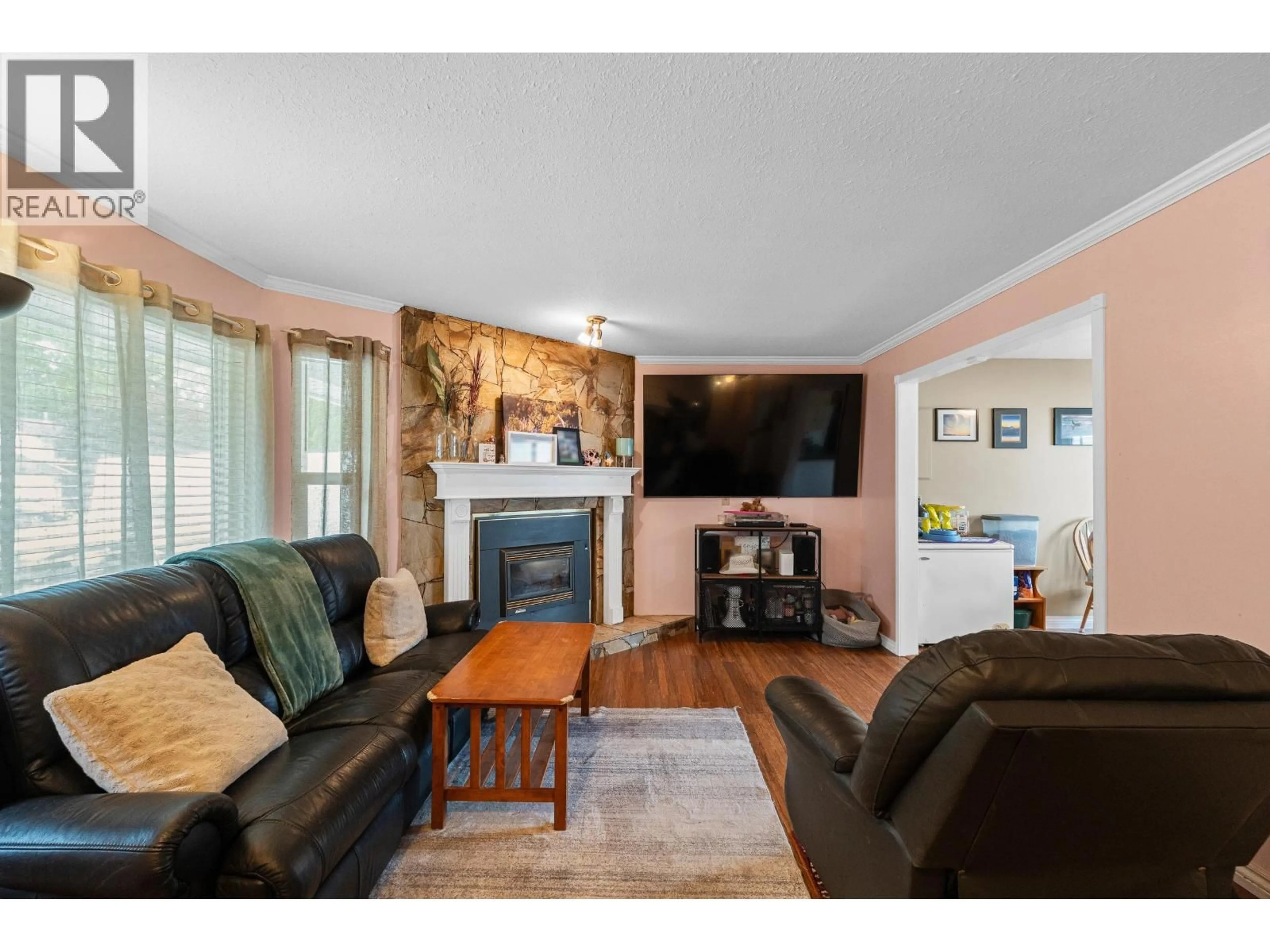 Living room with furniture, wood/laminate floor for 22760 BALABANIAN CIRCLE, Maple Ridge British Columbia V2X9C3