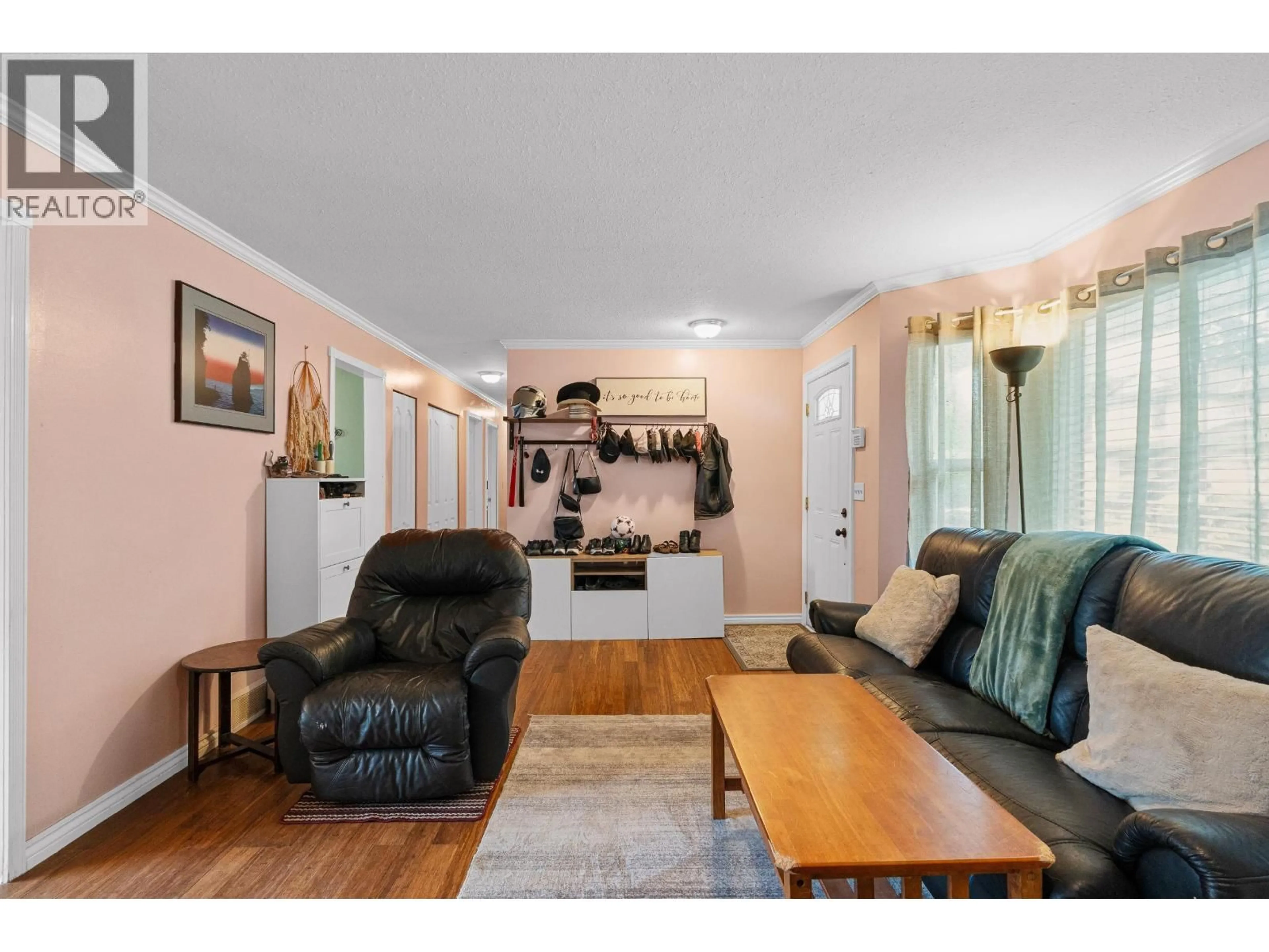Living room with furniture, wood/laminate floor for 22760 BALABANIAN CIRCLE, Maple Ridge British Columbia V2X9C3