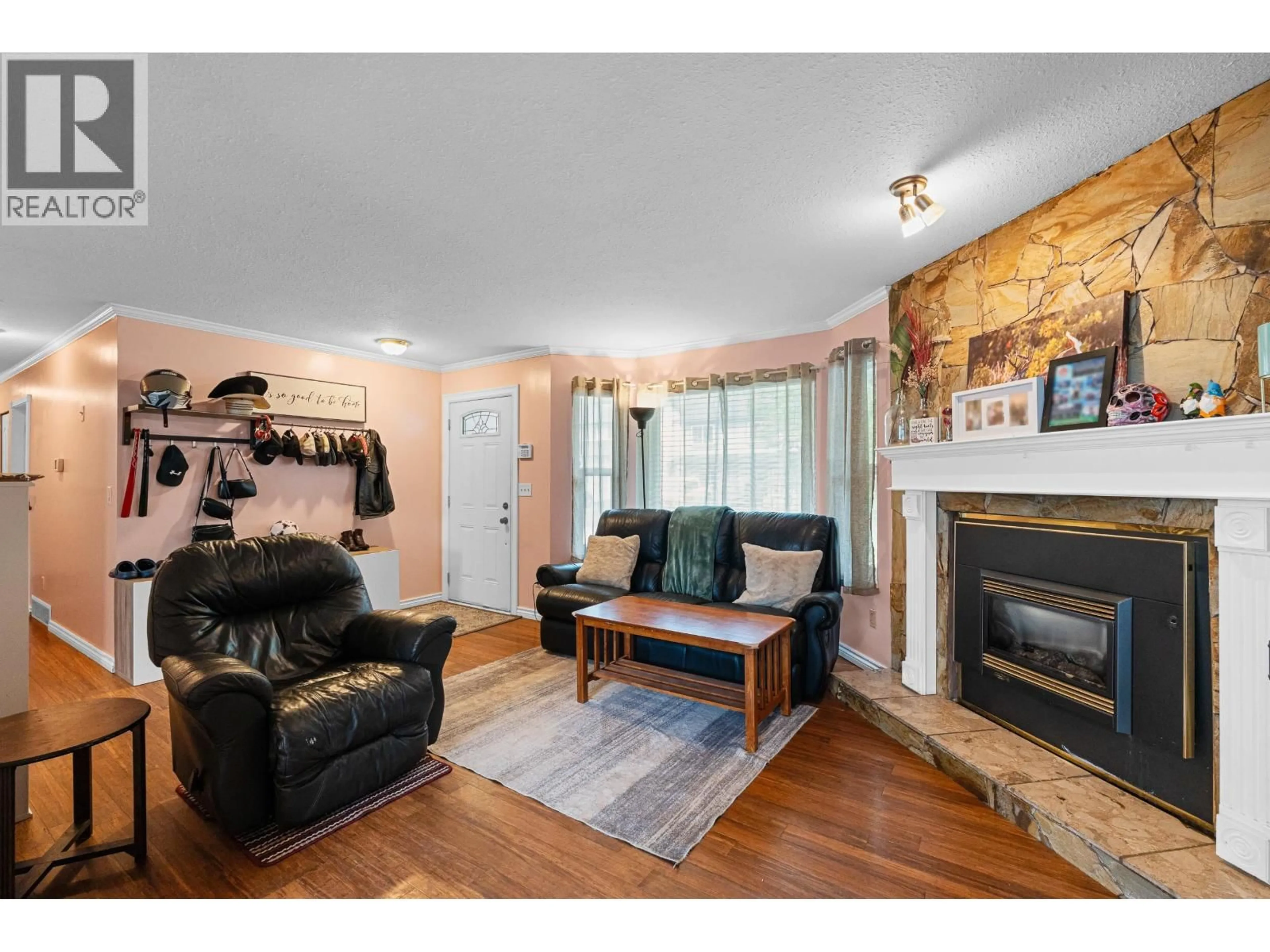 Living room with furniture, wood/laminate floor for 22760 BALABANIAN CIRCLE, Maple Ridge British Columbia V2X9C3