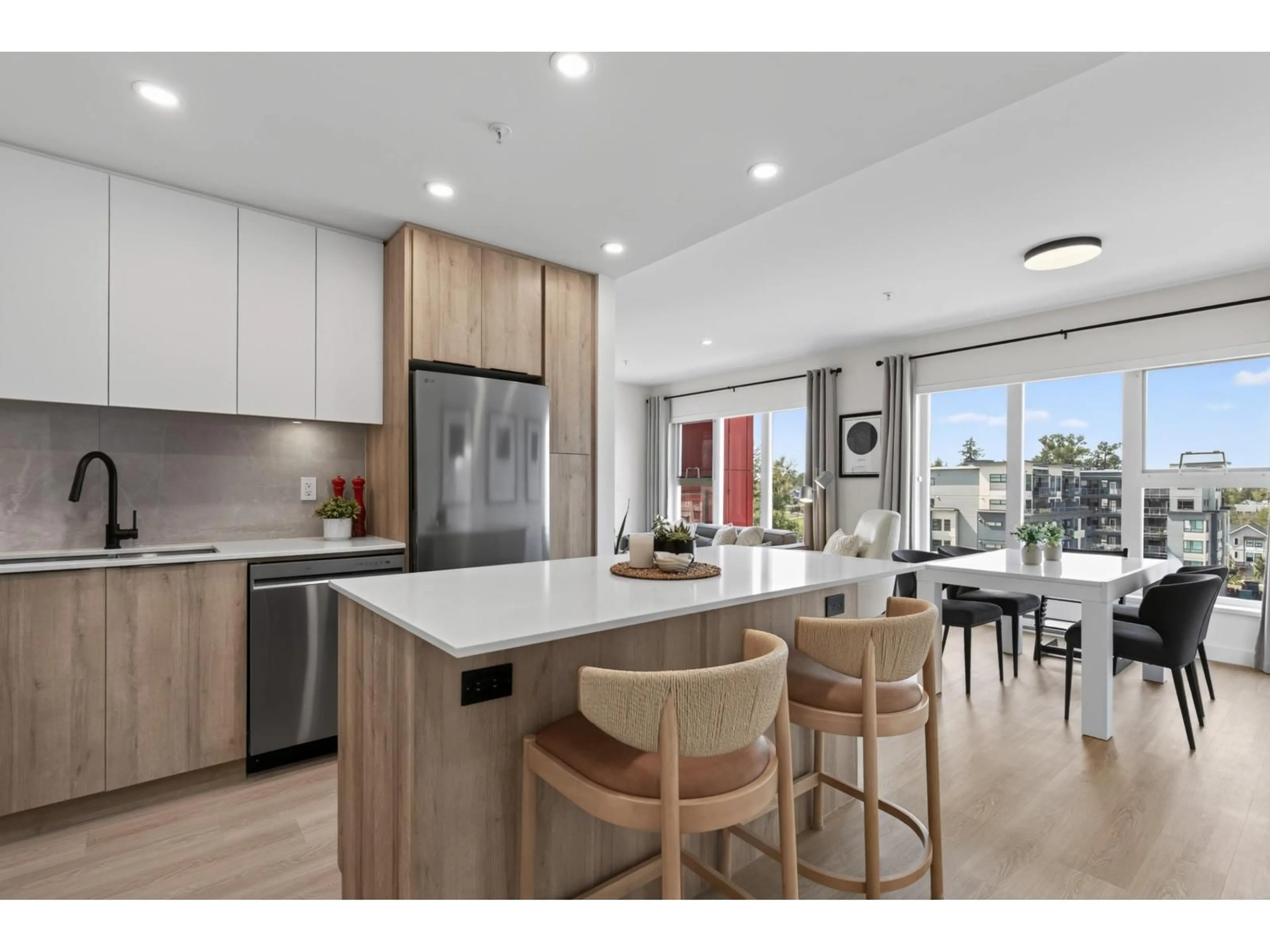 Open concept kitchen, wood/laminate floor for A521 - 7980 206A STREET, Langley British Columbia V2Y3Z8