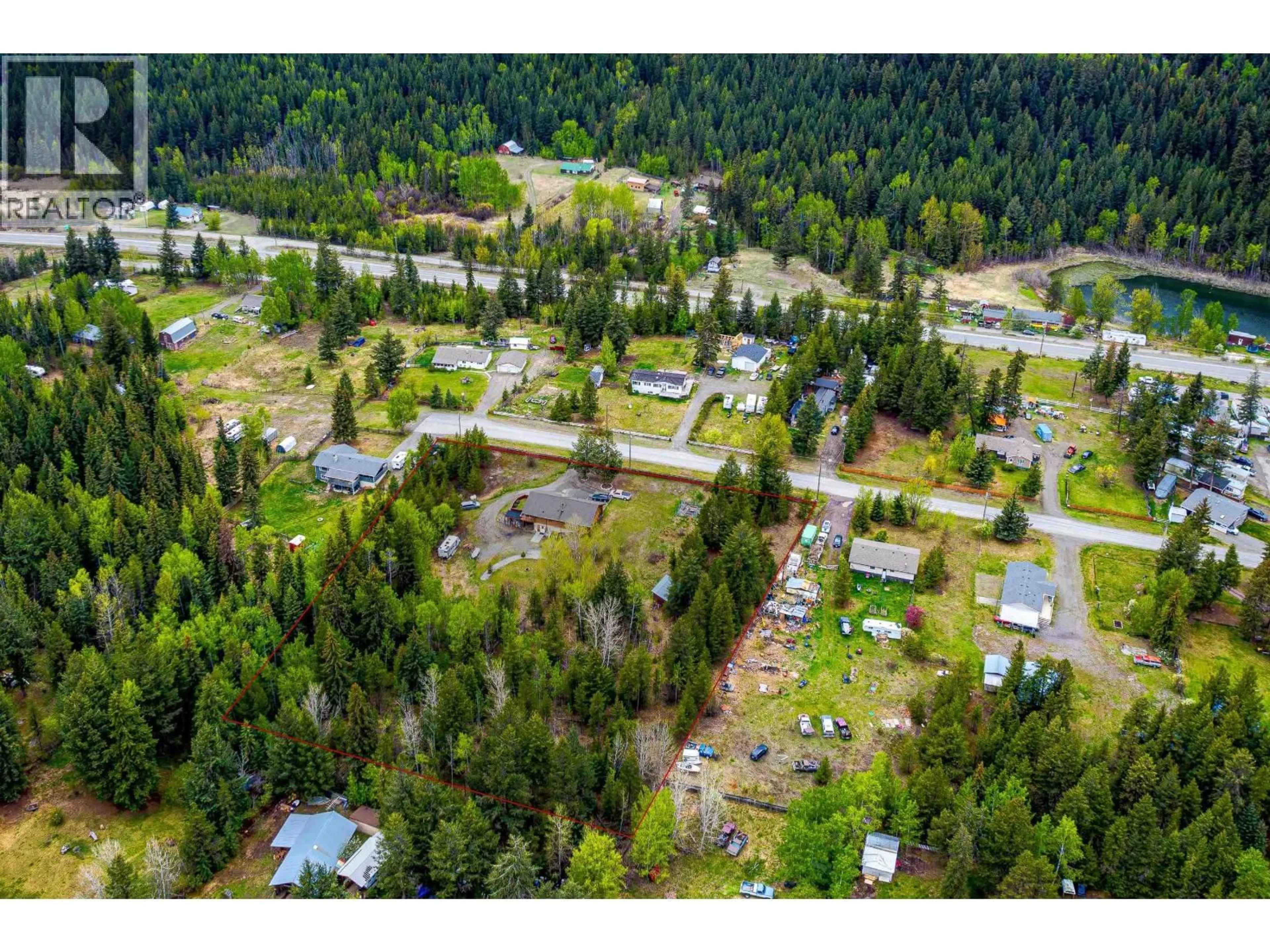 A pic from outside/outdoor area/front of a property/back of a property/a pic from drone, forest/trees view for 4122 WILDWOOD ROAD, Williams Lake British Columbia V2G4Z7