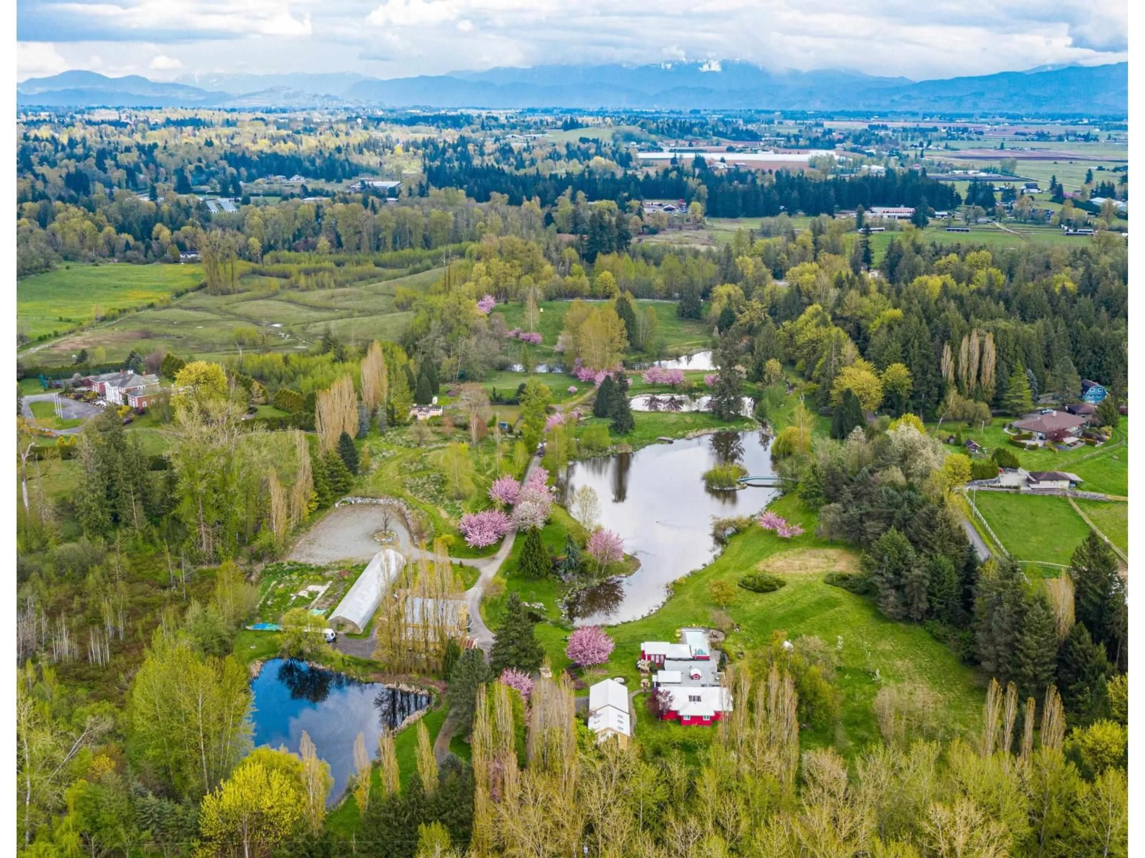 A pic from outside/outdoor area/front of a property/back of a property/a pic from drone, water/lake/river/ocean view for 462 248 STREET, Langley British Columbia V4W2H2
