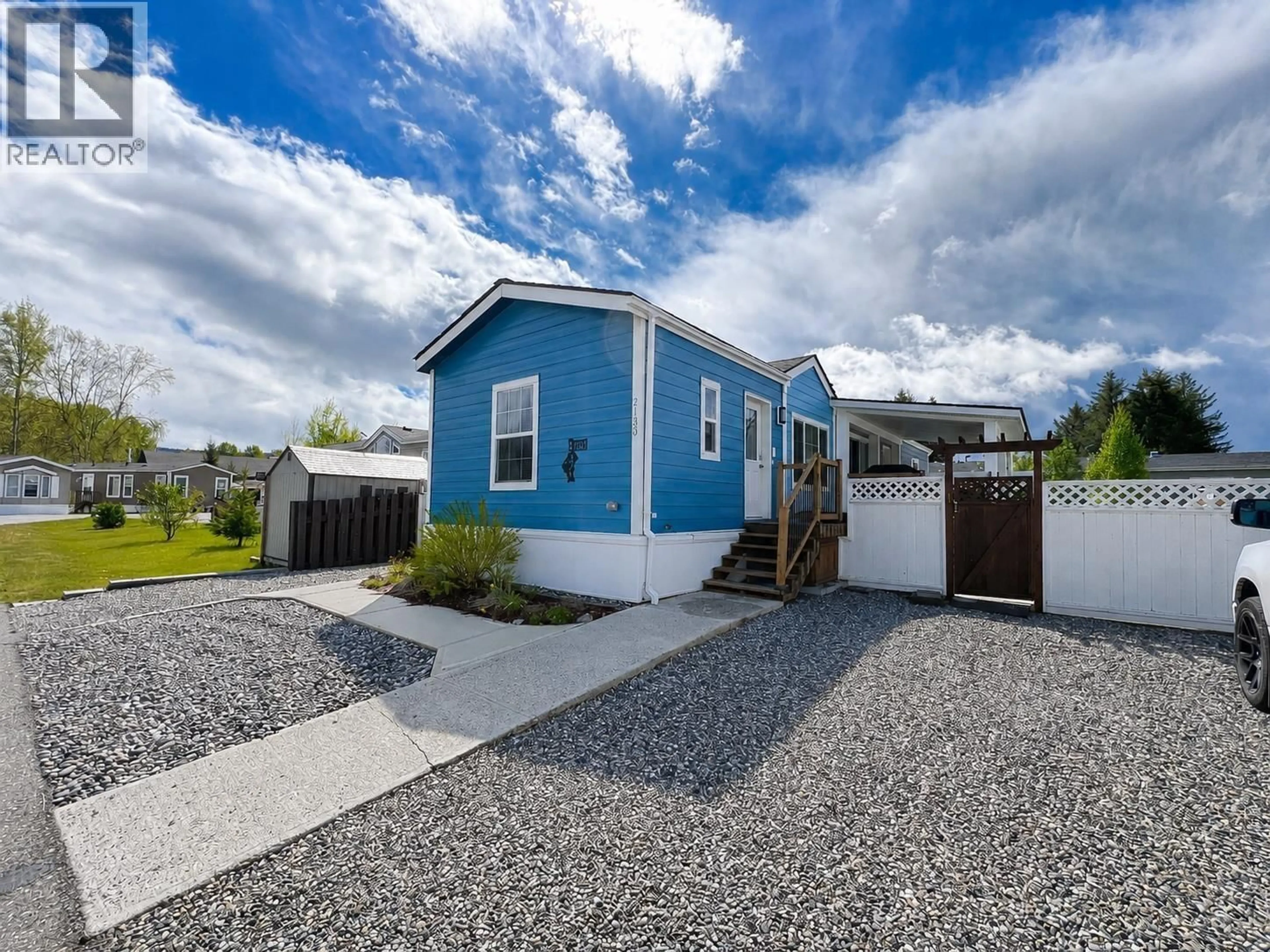Home with vinyl exterior material, street for 2130 GOLDEN POND ROAD, Quesnel British Columbia V2J7A2