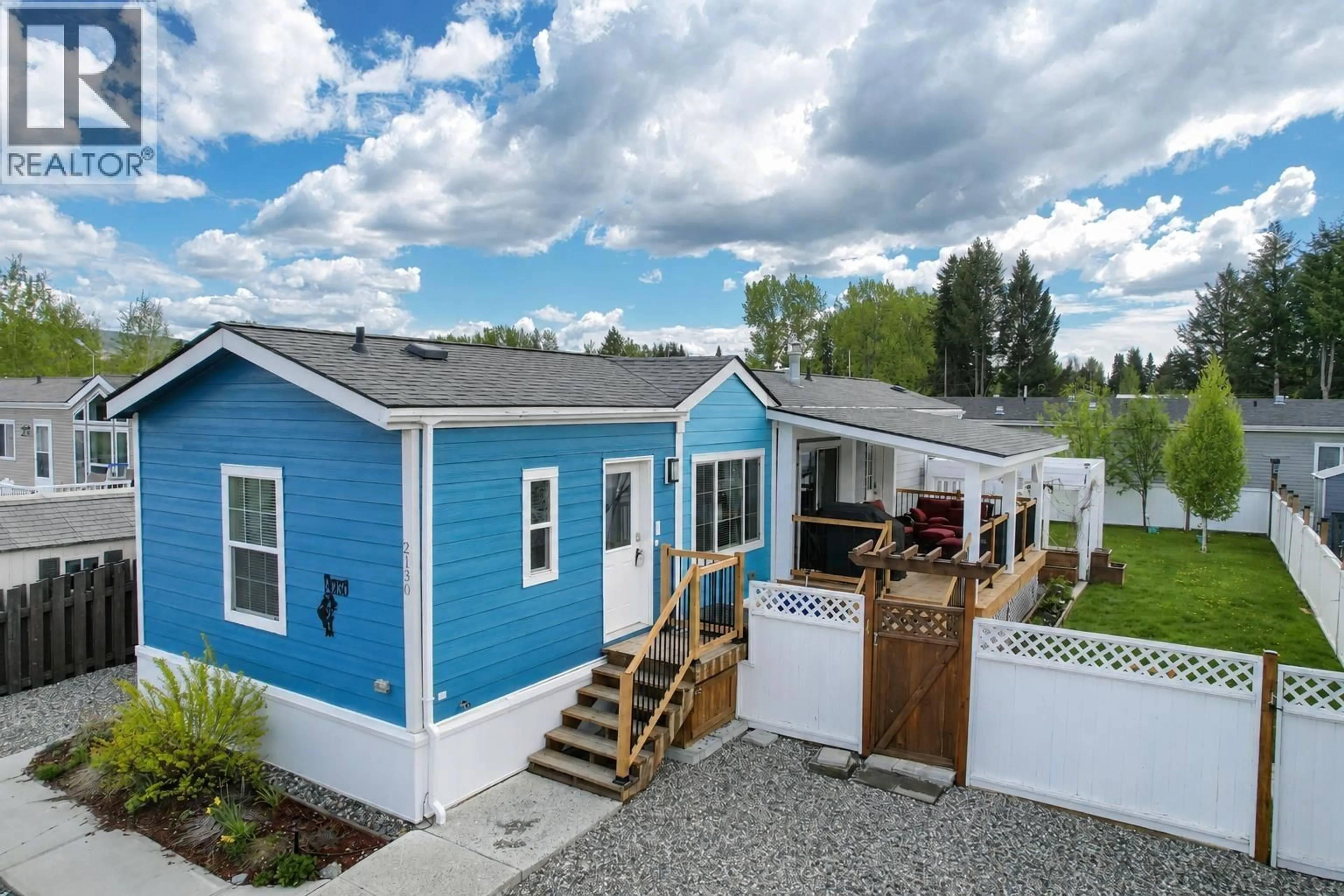 Home with vinyl exterior material, street for 2130 GOLDEN POND ROAD, Quesnel British Columbia V2J7A2