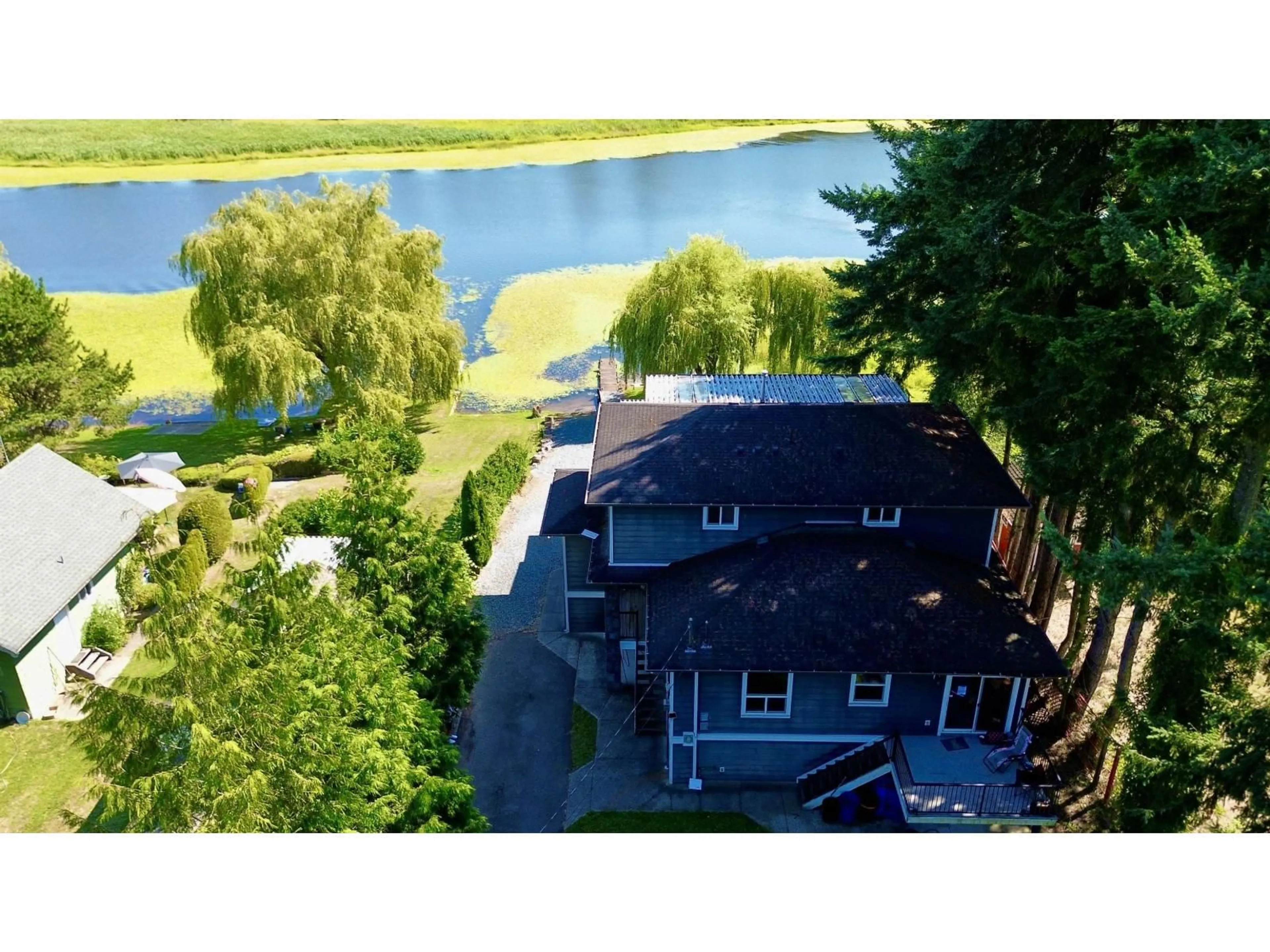 A pic from outside/outdoor area/front of a property/back of a property/a pic from drone, water/lake/river/ocean view for 8586 SHOOK ROAD, Mission British Columbia V2V7L8