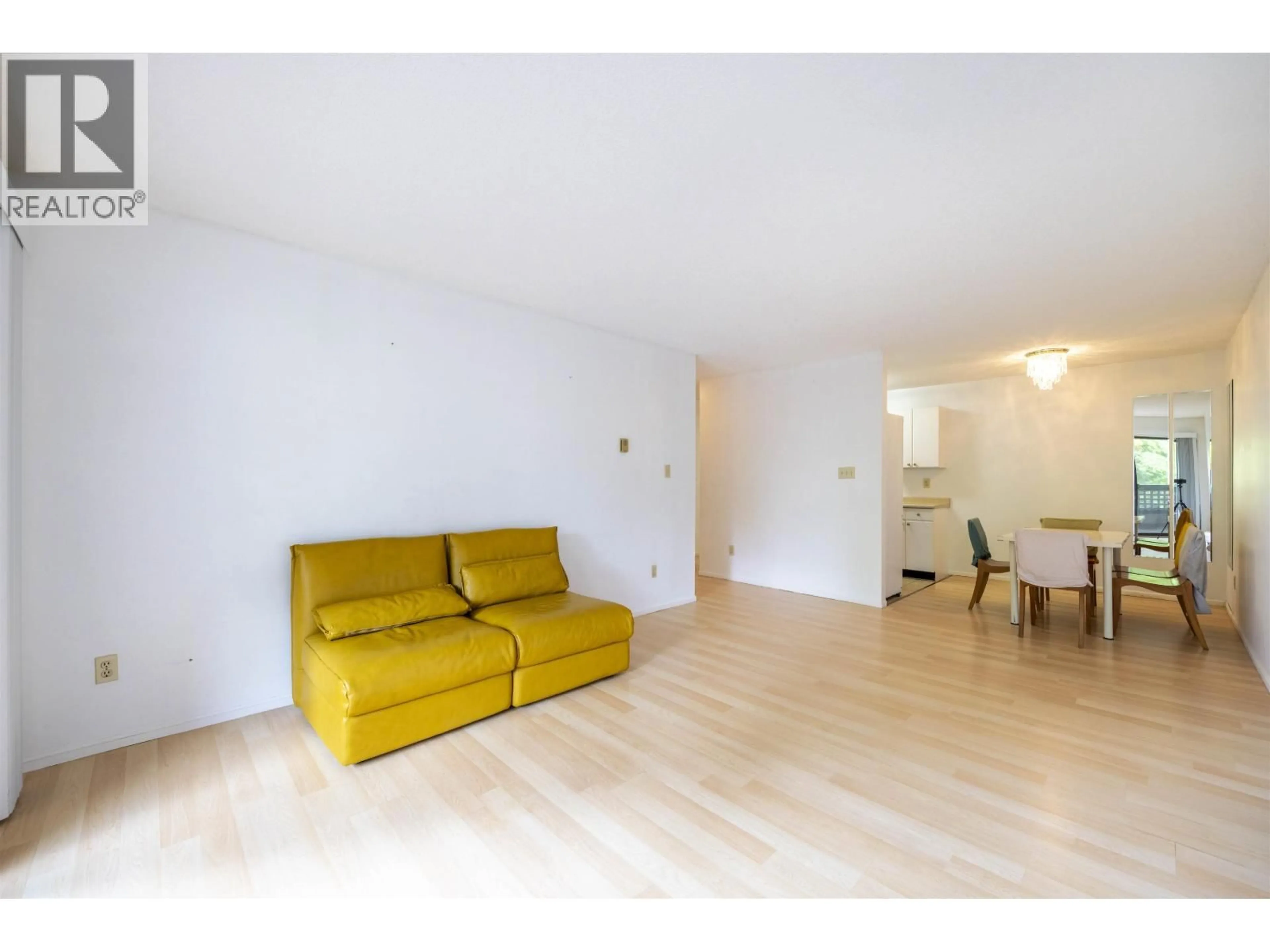 Living room with furniture, wood/laminate floor for 203 - 1195 PIPELINE ROAD, Coquitlam British Columbia V3B6J5