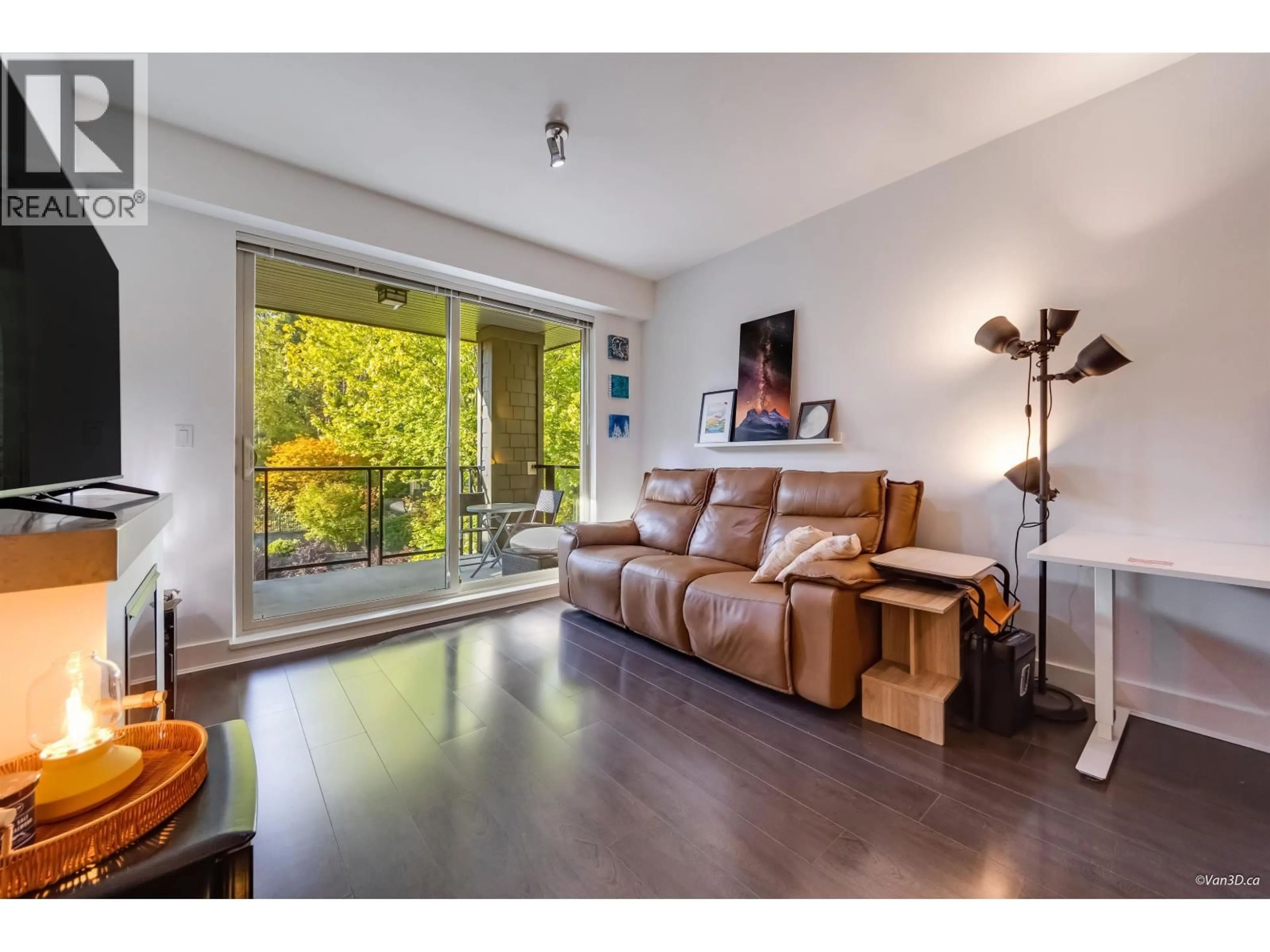 Living room with furniture, wood/laminate floor for 301 - 7418 BYRNEPARK WALK, Burnaby British Columbia V3N0B3