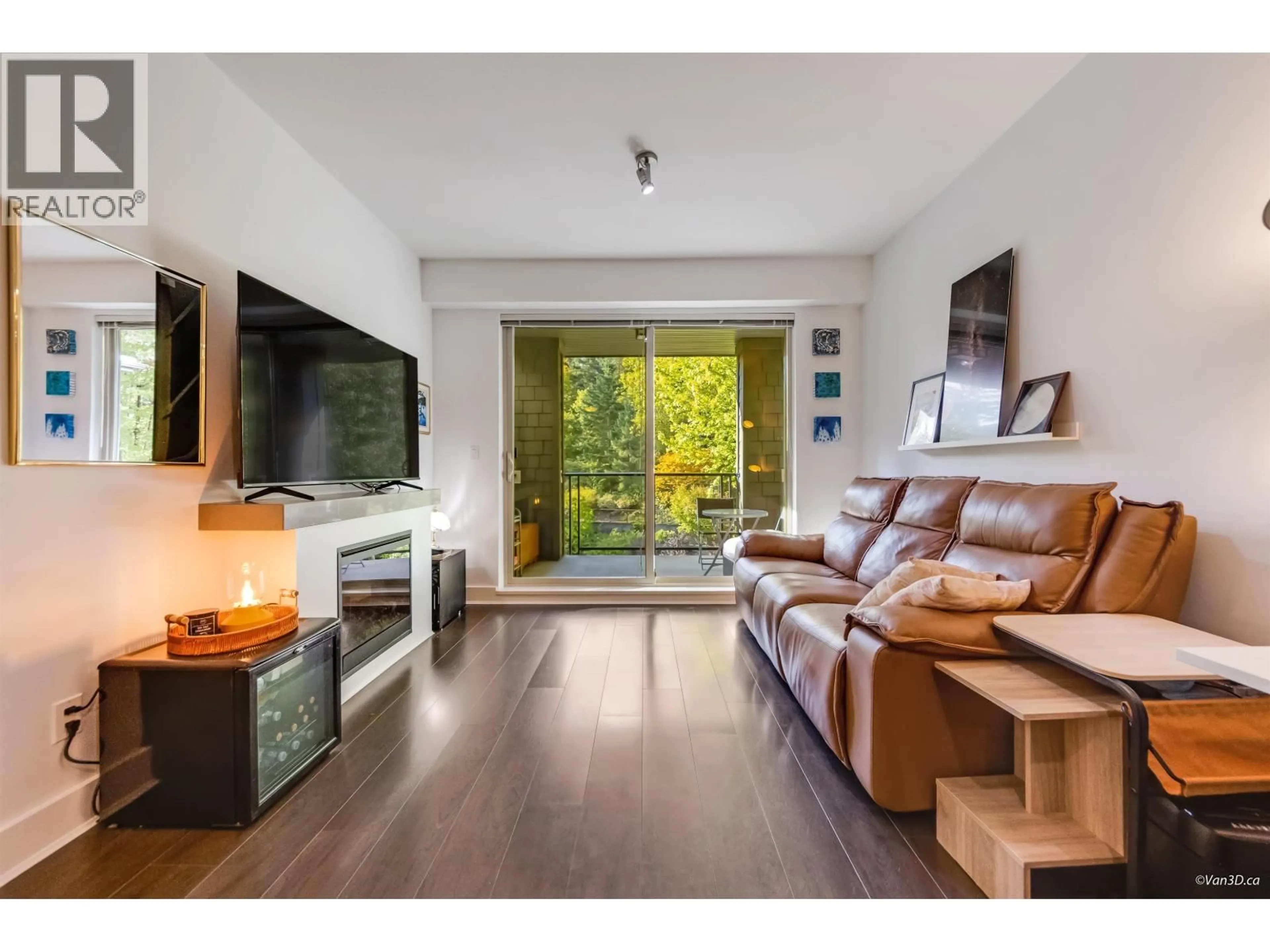 Living room with furniture, wood/laminate floor for 301 - 7418 BYRNEPARK WALK, Burnaby British Columbia V3N0B3