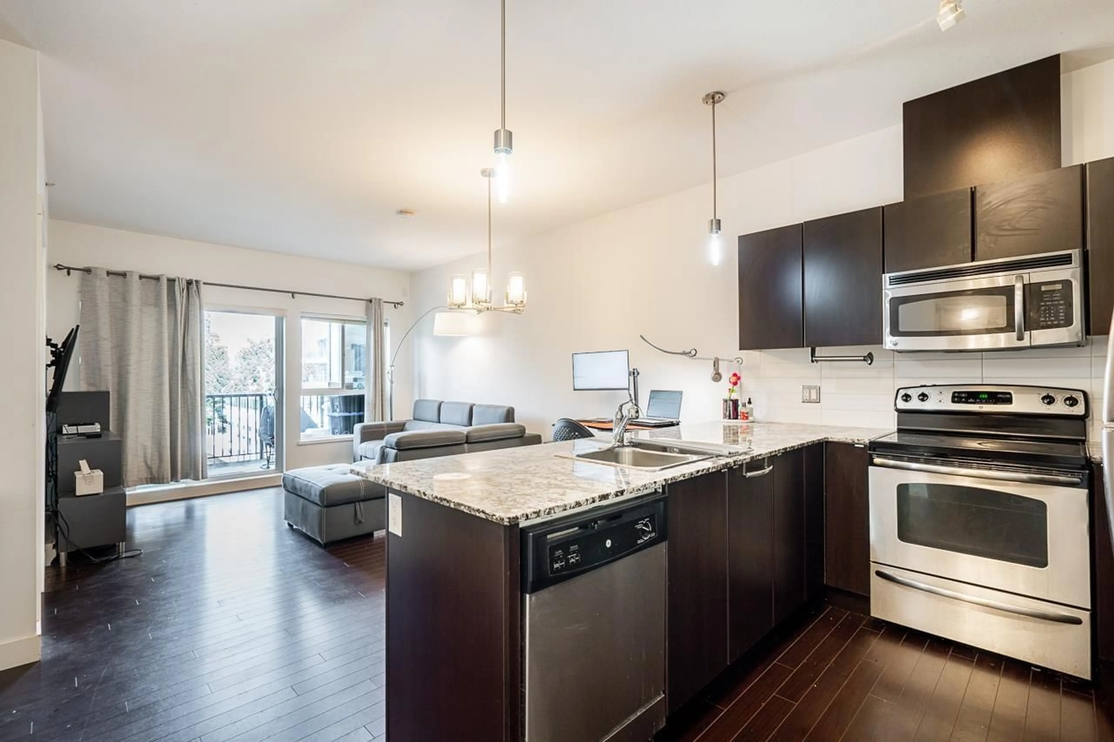 Open concept kitchen, unknown for 410 - 9655 KING GEORGE BOULEVARD, Surrey British Columbia V3T0C7