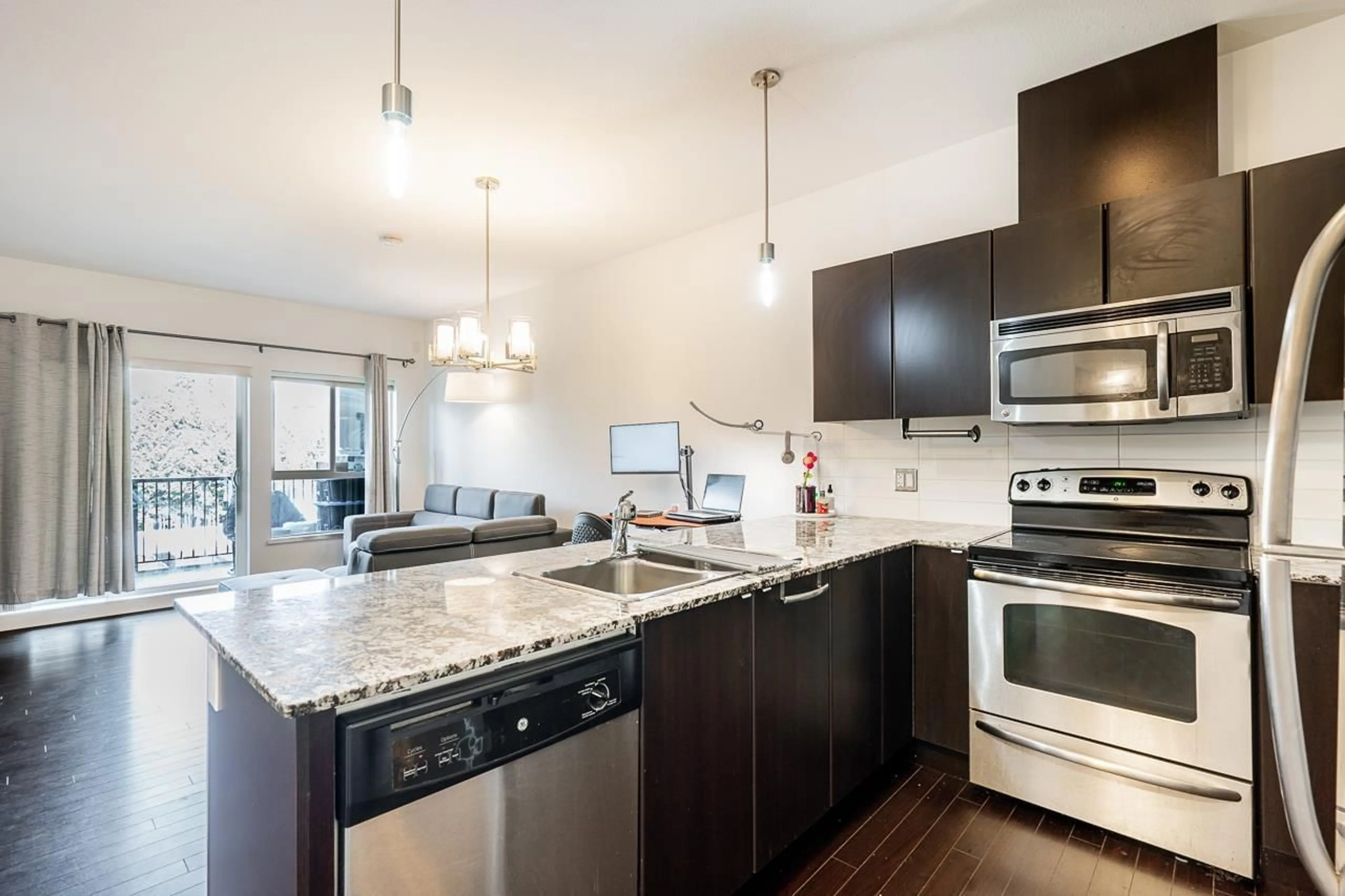 Open concept kitchen, unknown for 410 - 9655 KING GEORGE BOULEVARD, Surrey British Columbia V3T0C7