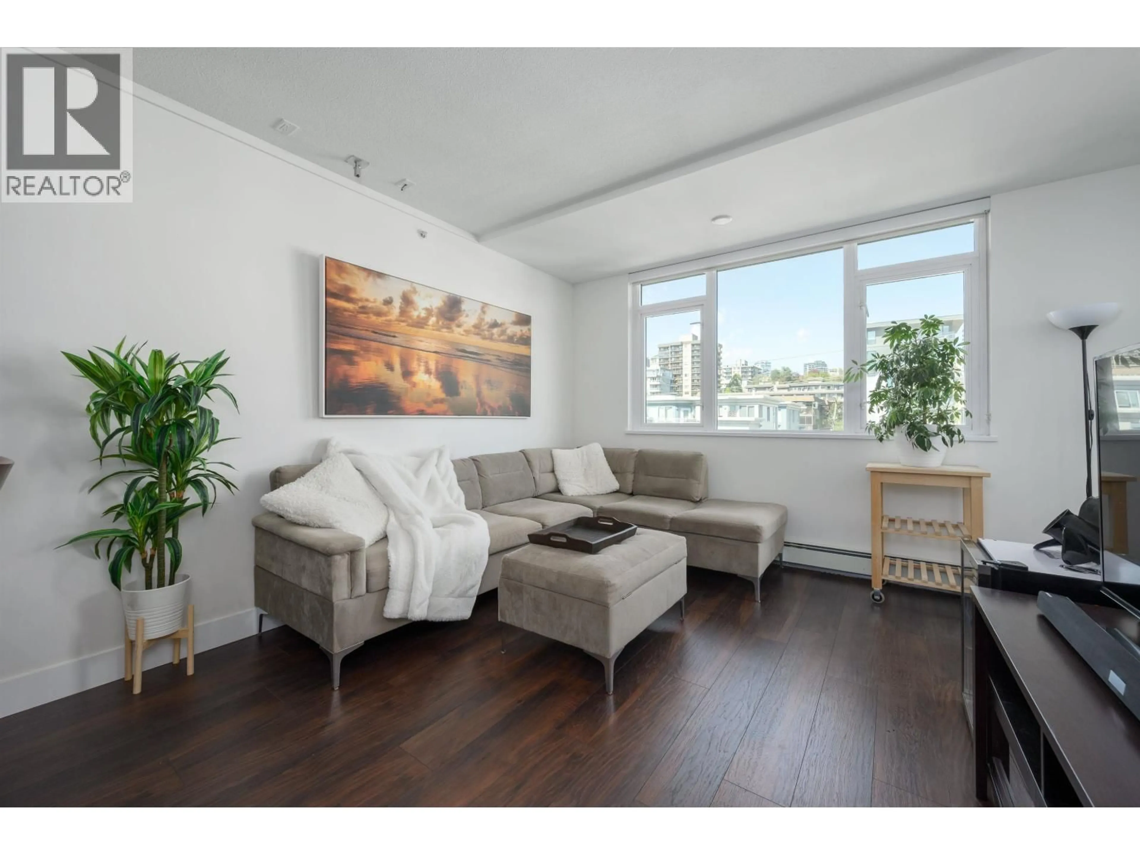 Living room with furniture, wood/laminate floor for 504 - 131 3RD STREET, North Vancouver British Columbia V7L0E3