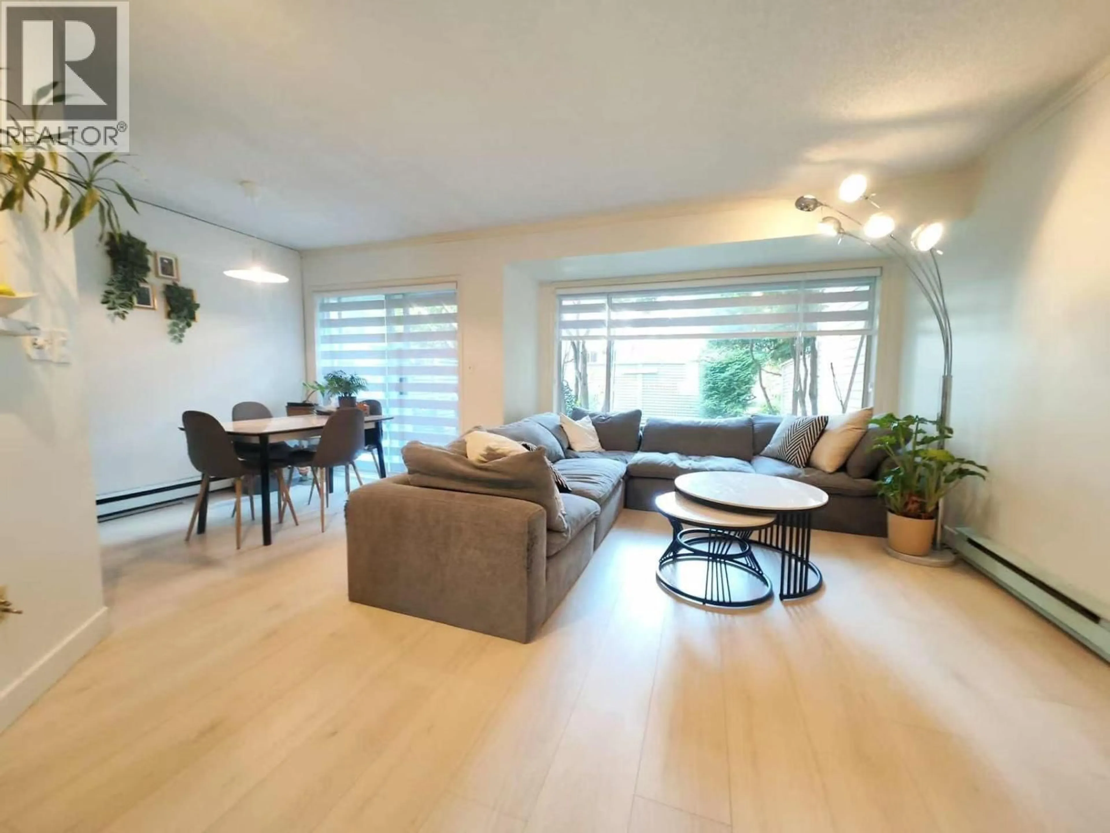 Living room with furniture, wood/laminate floor for 52 - 7400 MINORU BOULEVARD, Richmond British Columbia V6Y3J5