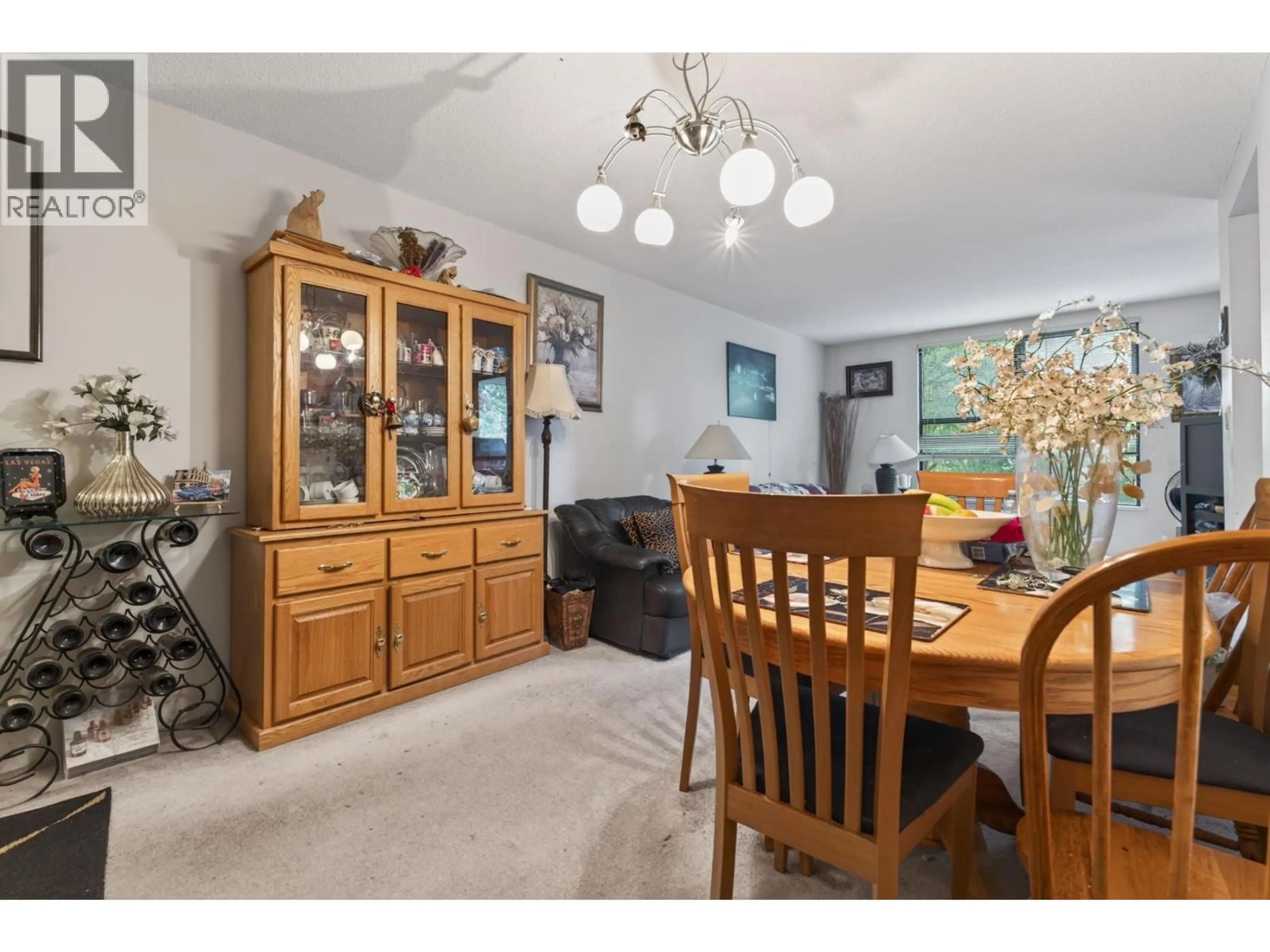 Dining room, wood/laminate floor for 208 - 5288 MELBOURNE STREET, Vancouver British Columbia V5R6E6