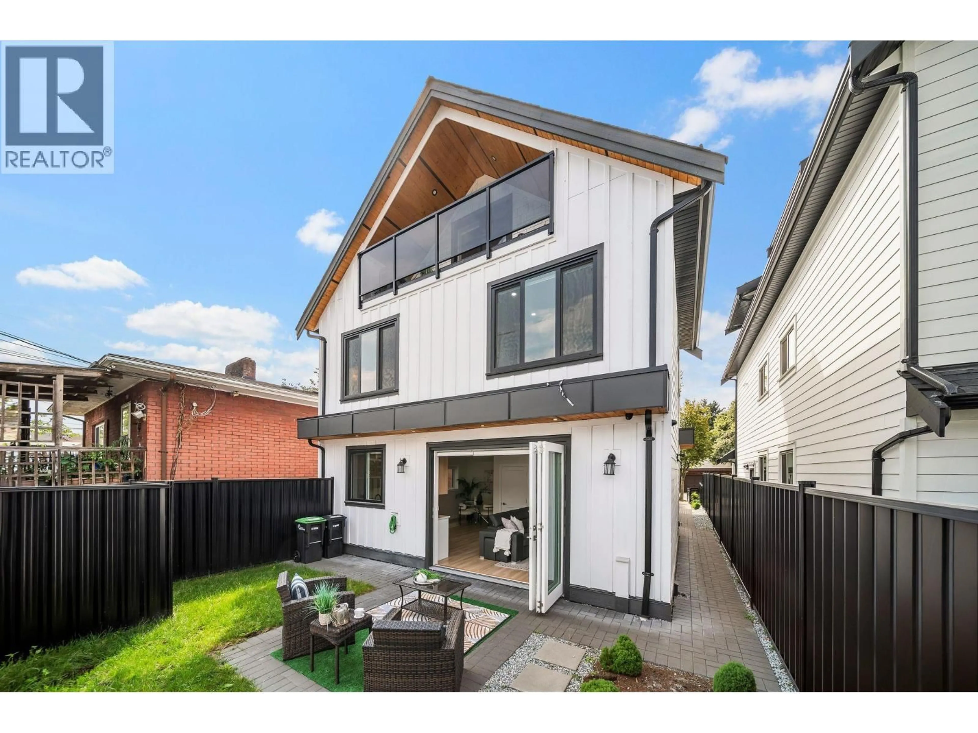 Home with brick exterior material, street for 2369 ADANAC STREET, Vancouver British Columbia V5L2E9