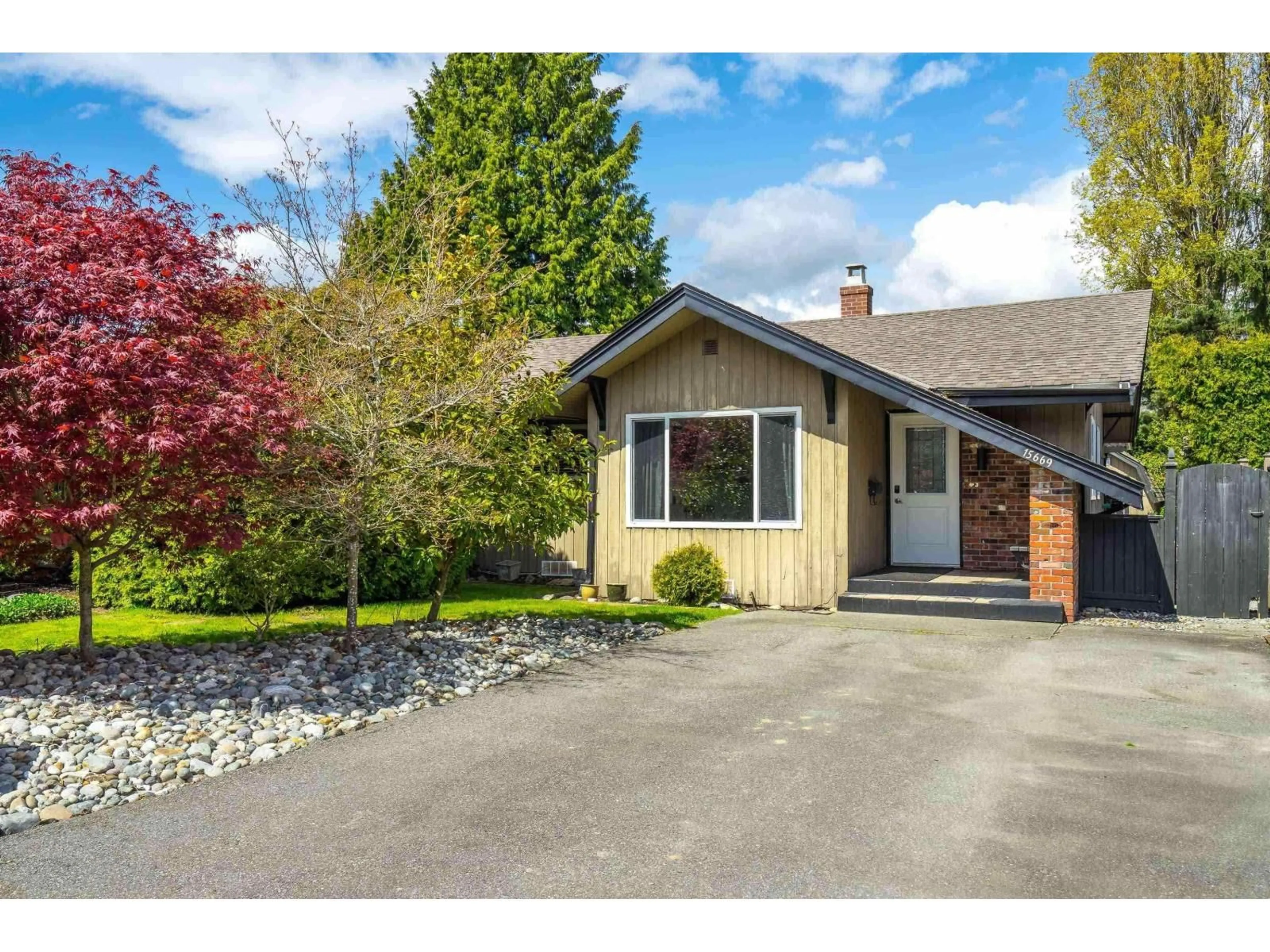 Home with vinyl exterior material, street for 15669 20 AVENUE, Surrey British Columbia V4A2A7