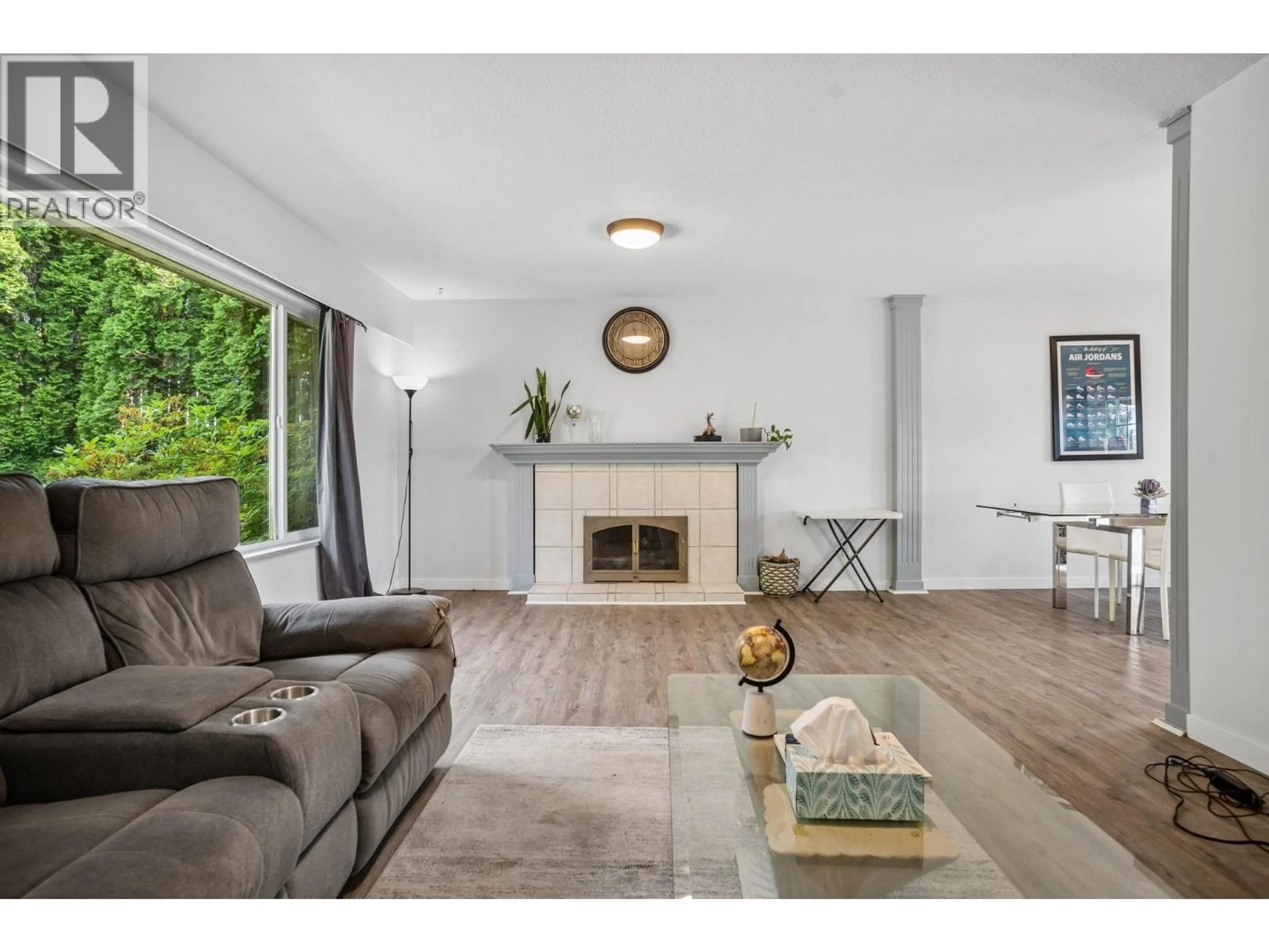 Living room with furniture, wood/laminate floor for 1617 WESTERN DRIVE, Port Coquitlam British Columbia V3C2X1