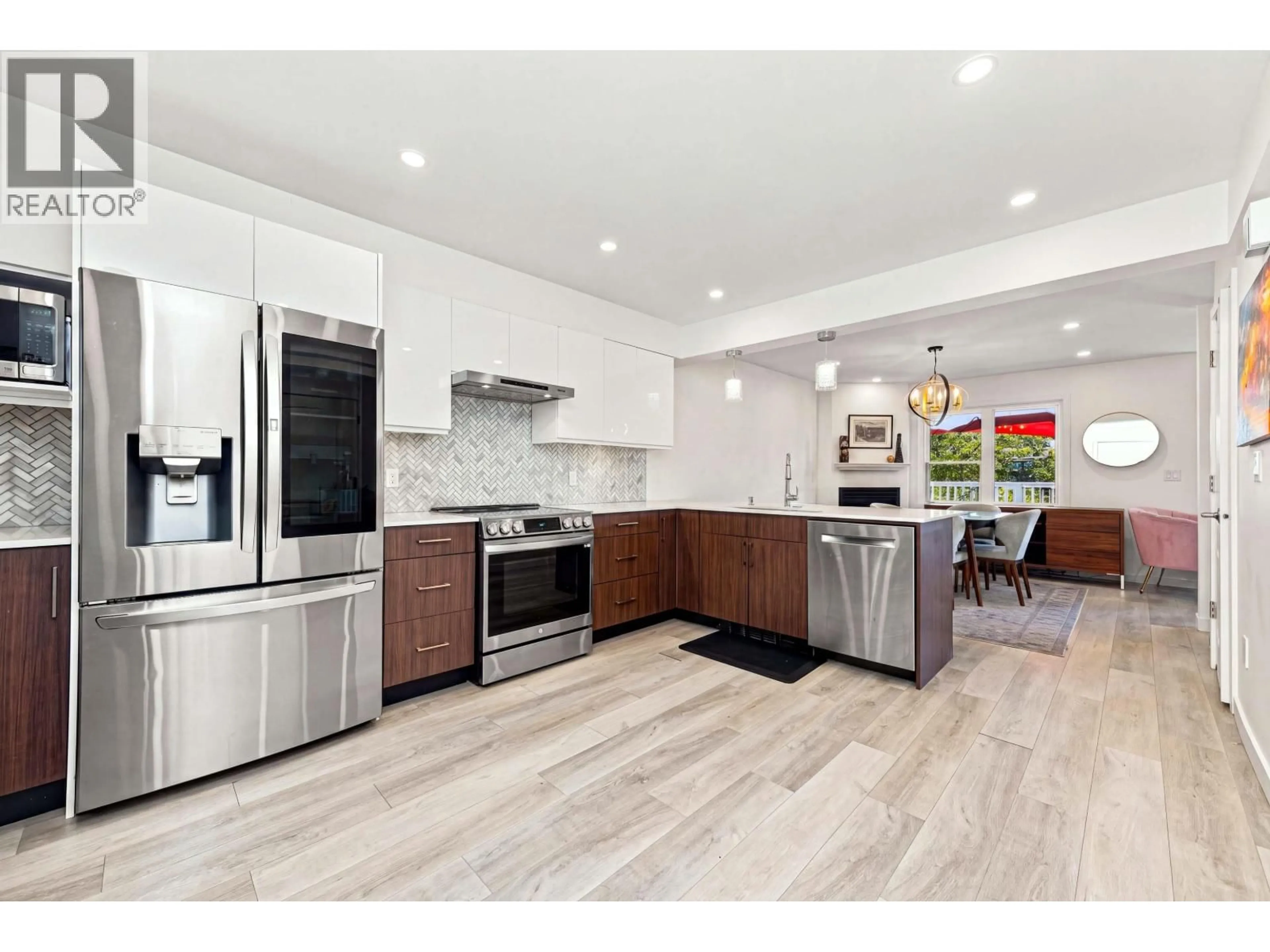 Open concept kitchen, unknown for 203 - 1513 BOWSER AVENUE, North Vancouver British Columbia V7P2Y4