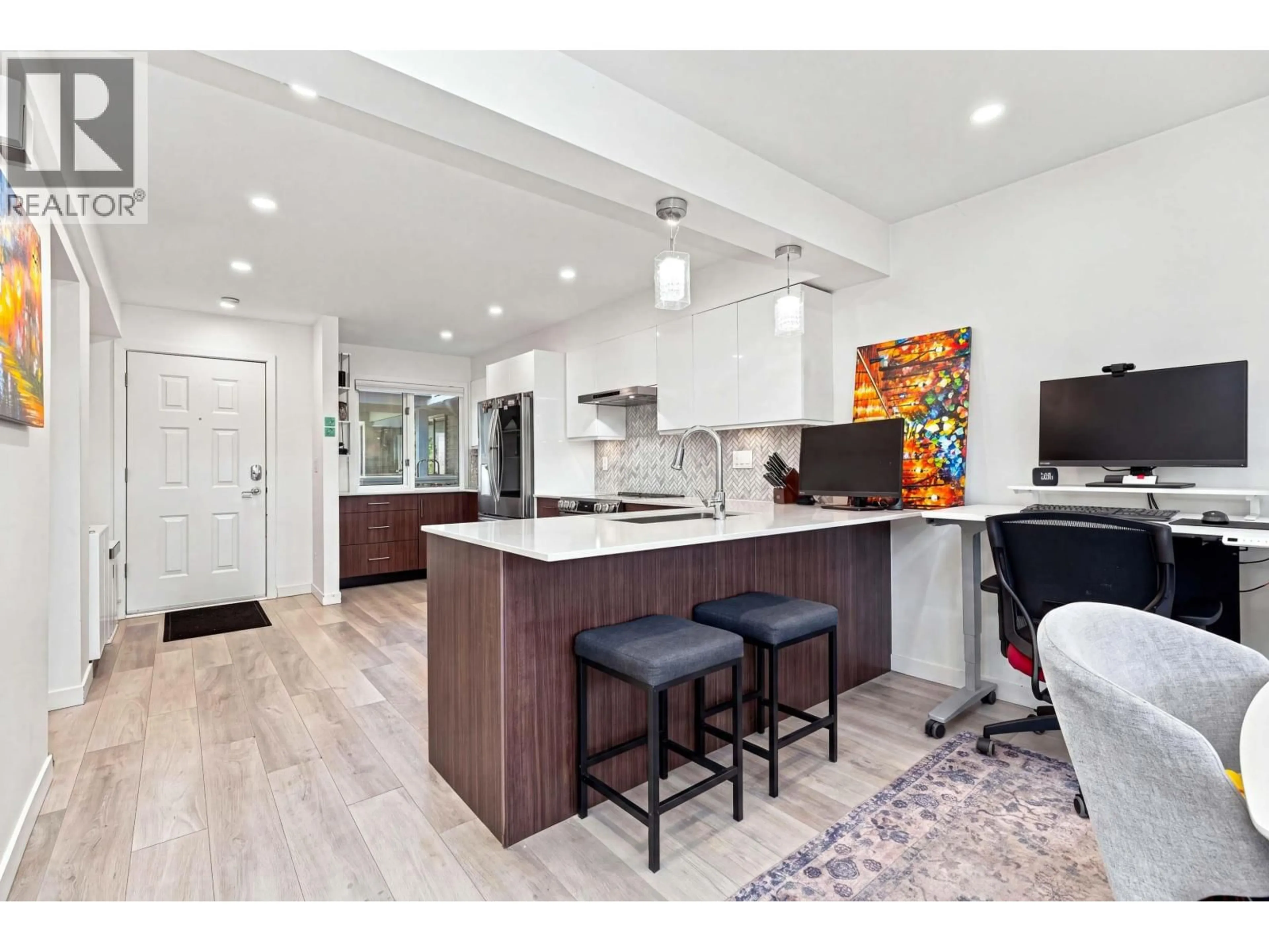 Open concept kitchen, unknown for 203 - 1513 BOWSER AVENUE, North Vancouver British Columbia V7P2Y4