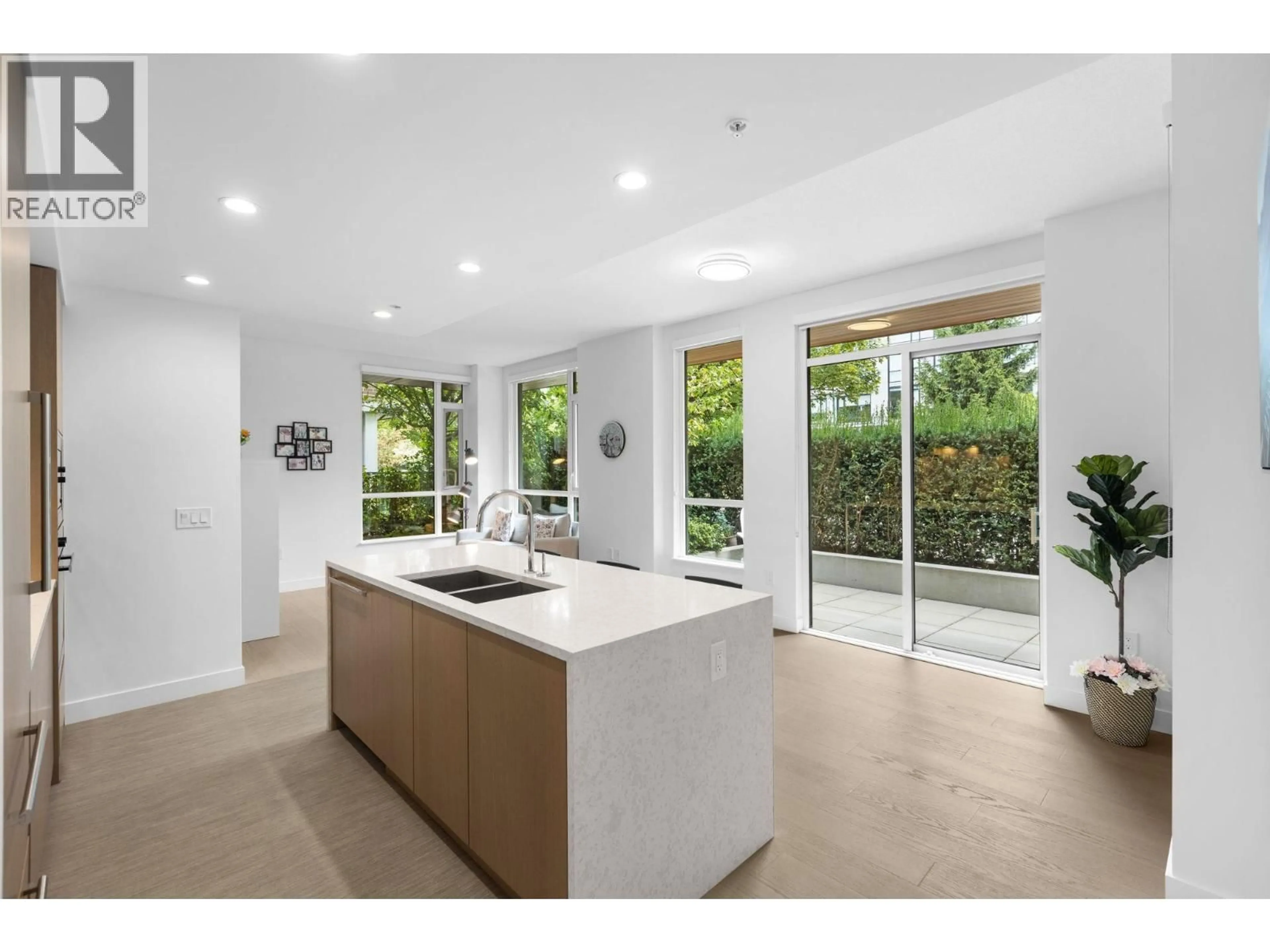 Open concept kitchen, ceramic/tile floor for 109 - 469 KING EDWARD AVENUE, Vancouver British Columbia V5Y2J3
