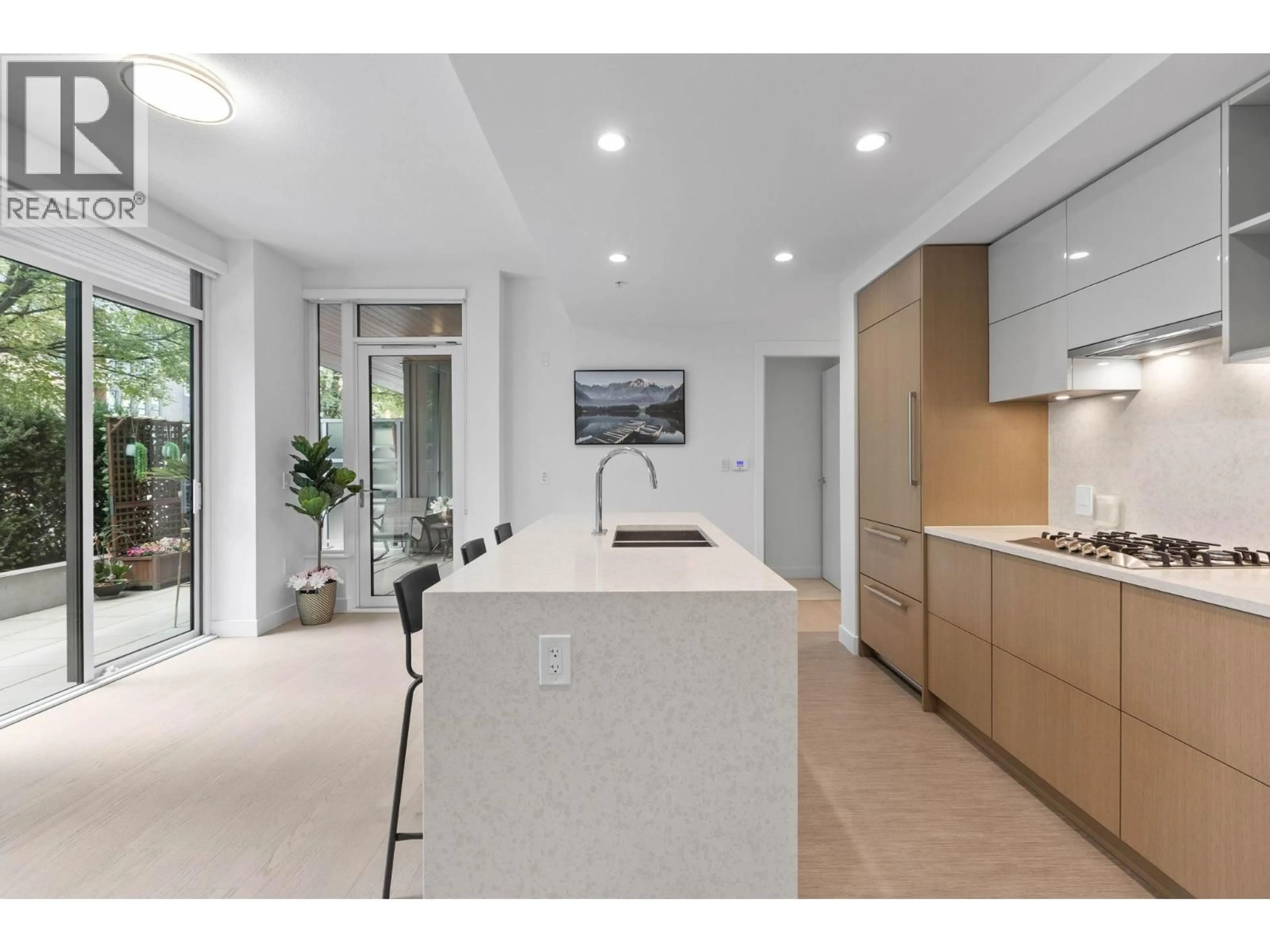 Open concept kitchen, unknown for 109 - 469 KING EDWARD AVENUE, Vancouver British Columbia V5Y2J3