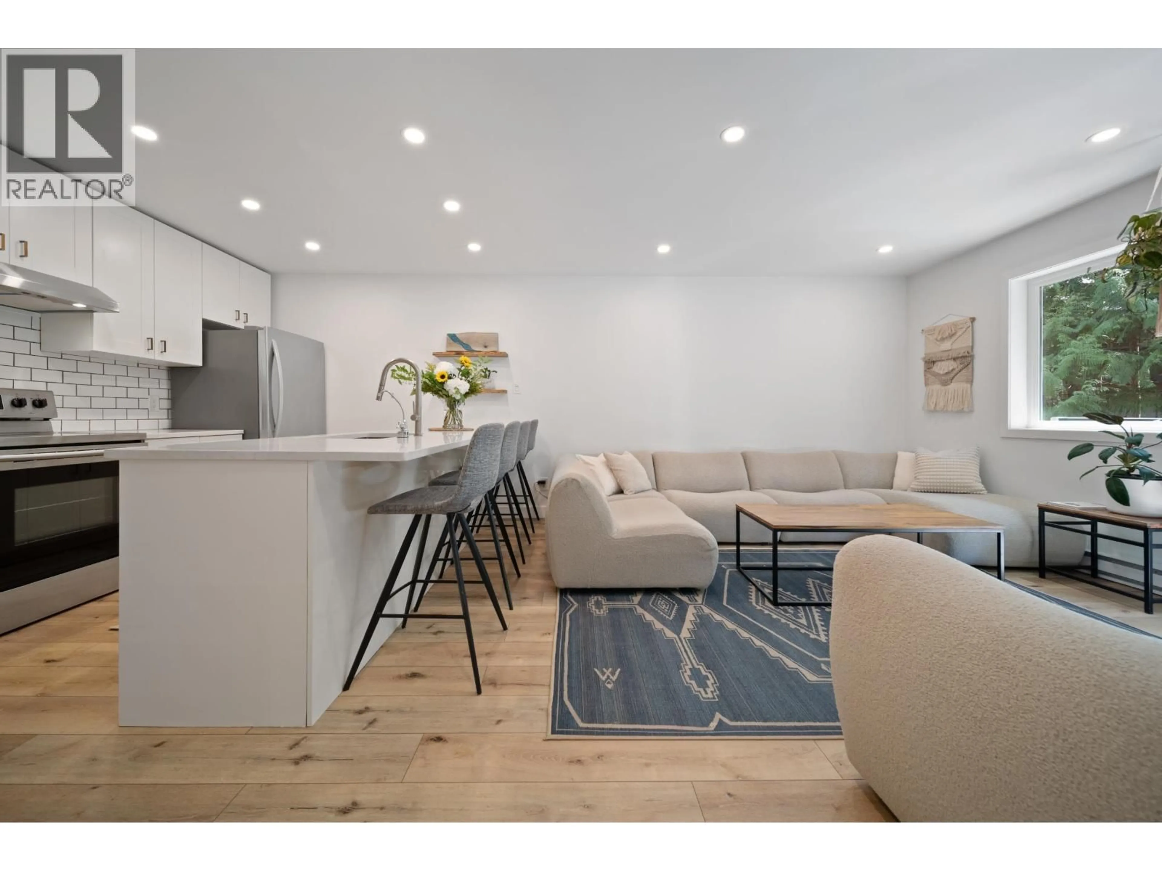 Open concept kitchen, wood/laminate floor for 3A - 2230 EVA LAKE ROAD, Whistler British Columbia V8E0M5