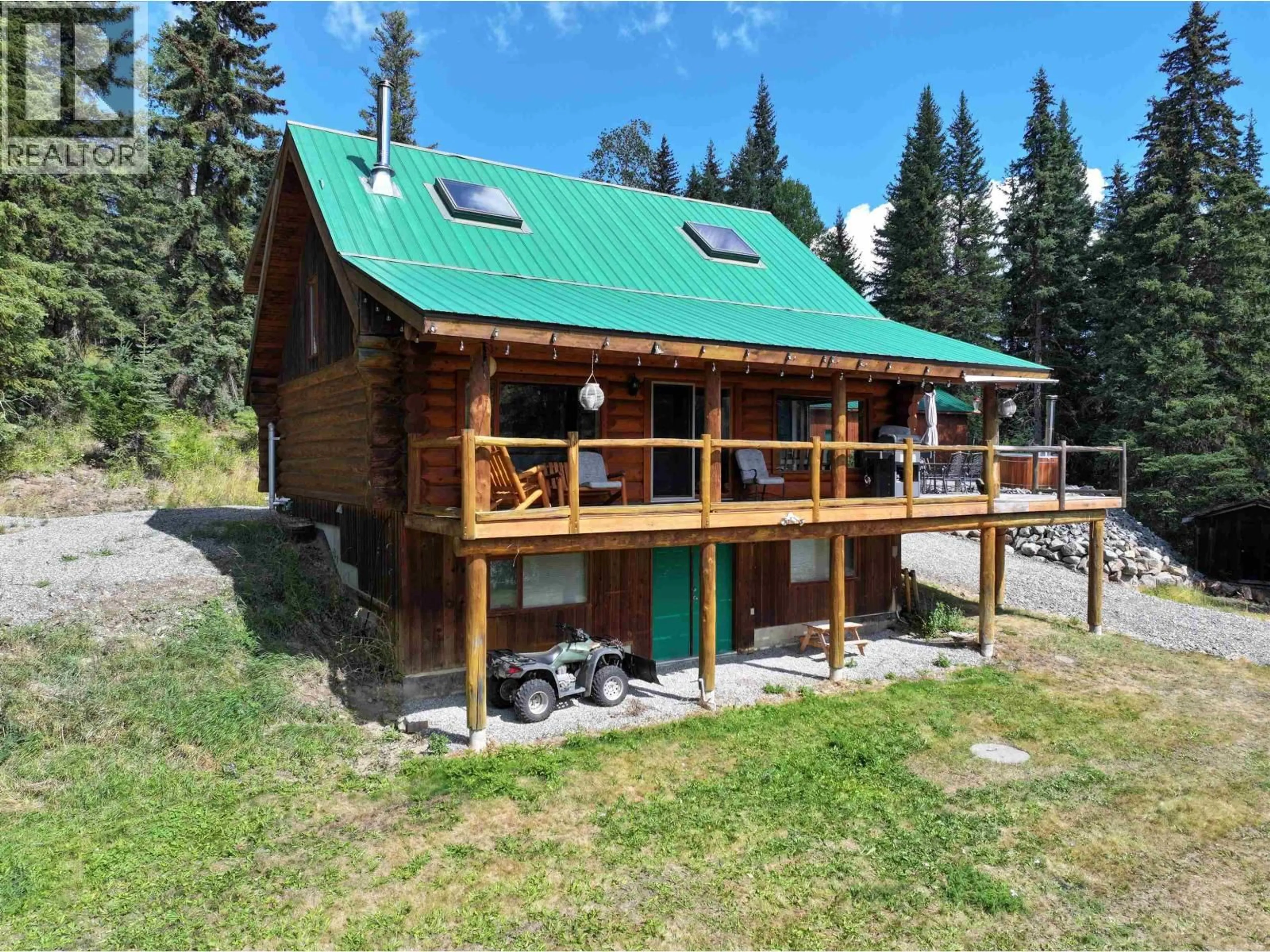 A pic from outside/outdoor area/front of a property/back of a property/a pic from drone, building for 8246 CENTENNIAL ROAD, Bridge Lake British Columbia V0K1X2