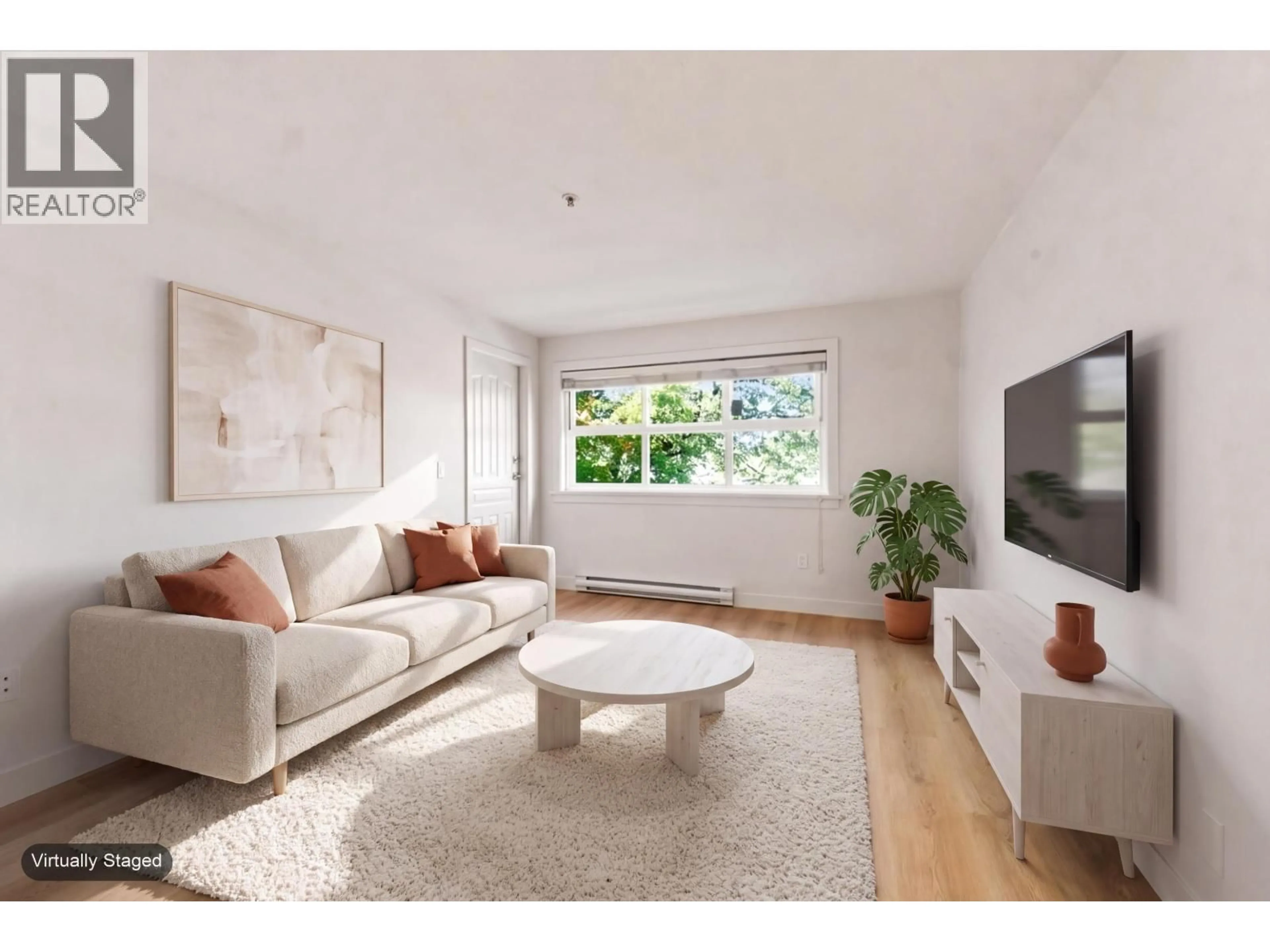 Living room with furniture, unknown for 301 - 2928 COMMERCIAL DRIVE, Vancouver British Columbia V5N4C9