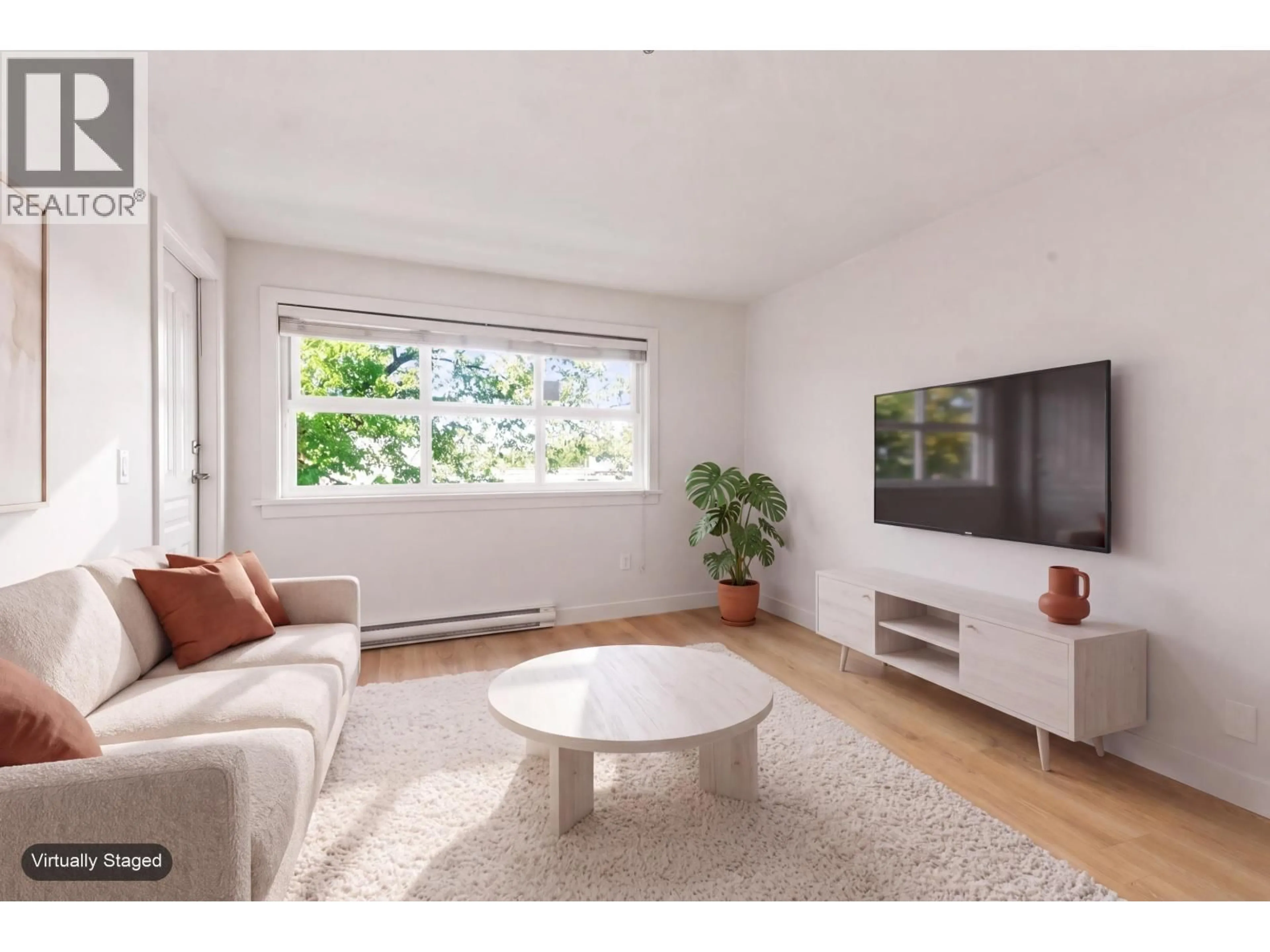 Living room with furniture, unknown for 301 - 2928 COMMERCIAL DRIVE, Vancouver British Columbia V5N4C9