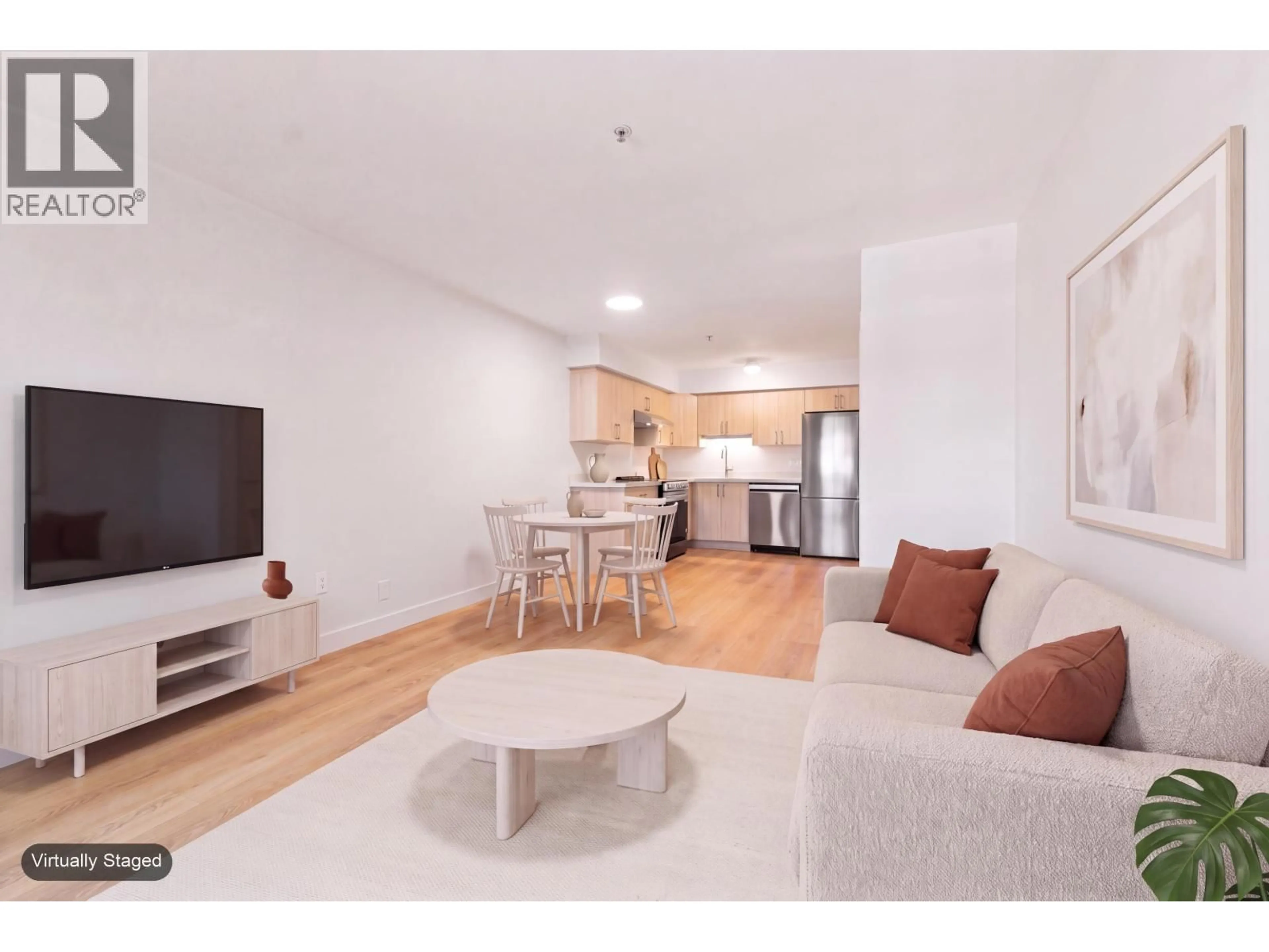 Living room with furniture, wood/laminate floor for 301 - 2928 COMMERCIAL DRIVE, Vancouver British Columbia V5N4C9
