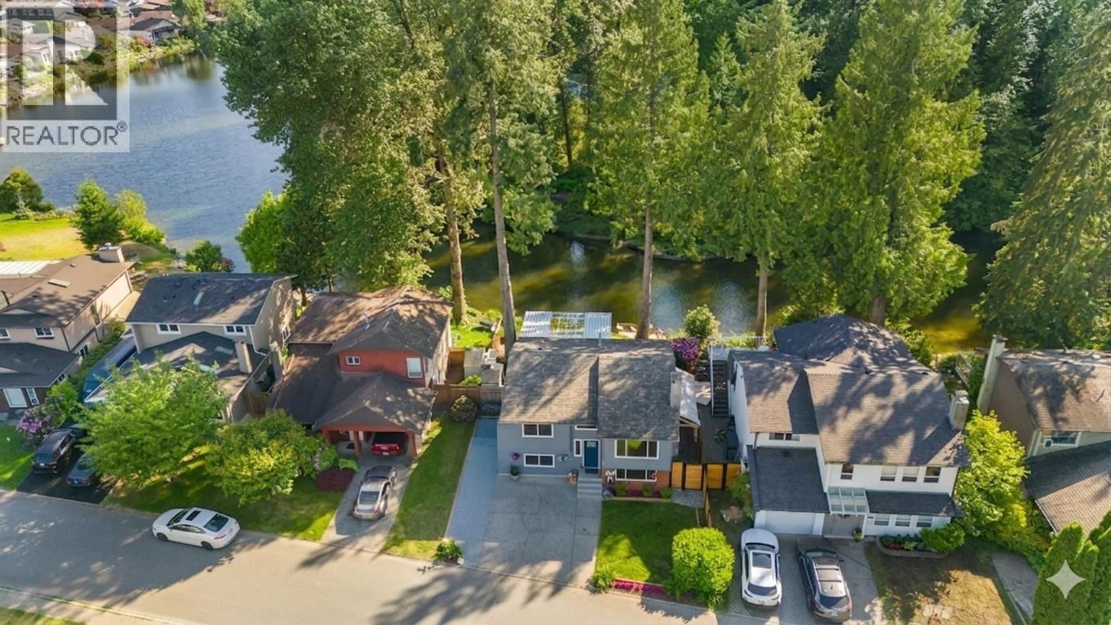 A pic from outside/outdoor area/front of a property/back of a property/a pic from drone, water/lake/river/ocean view for 1231 RIVER DRIVE, Coquitlam British Columbia V3E1N7