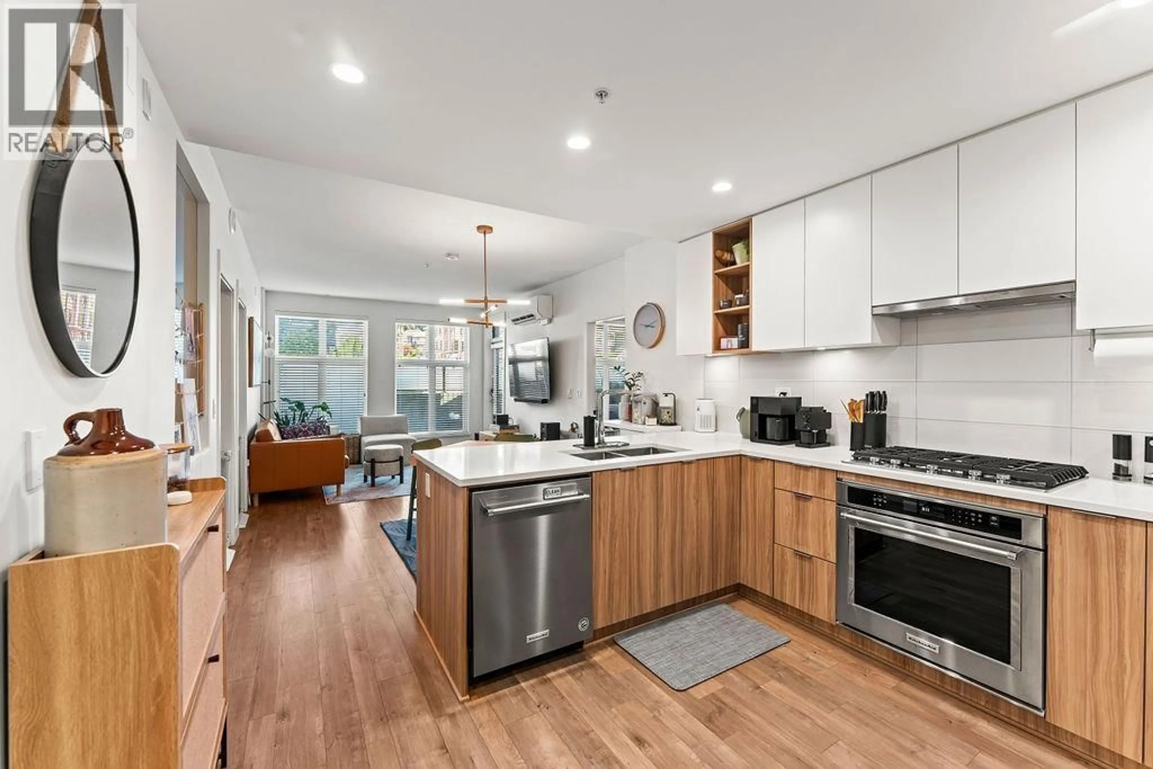 Open concept kitchen, wood/laminate floor for 101 - 750 DOGWOOD STREET, Coquitlam British Columbia V3J4B7