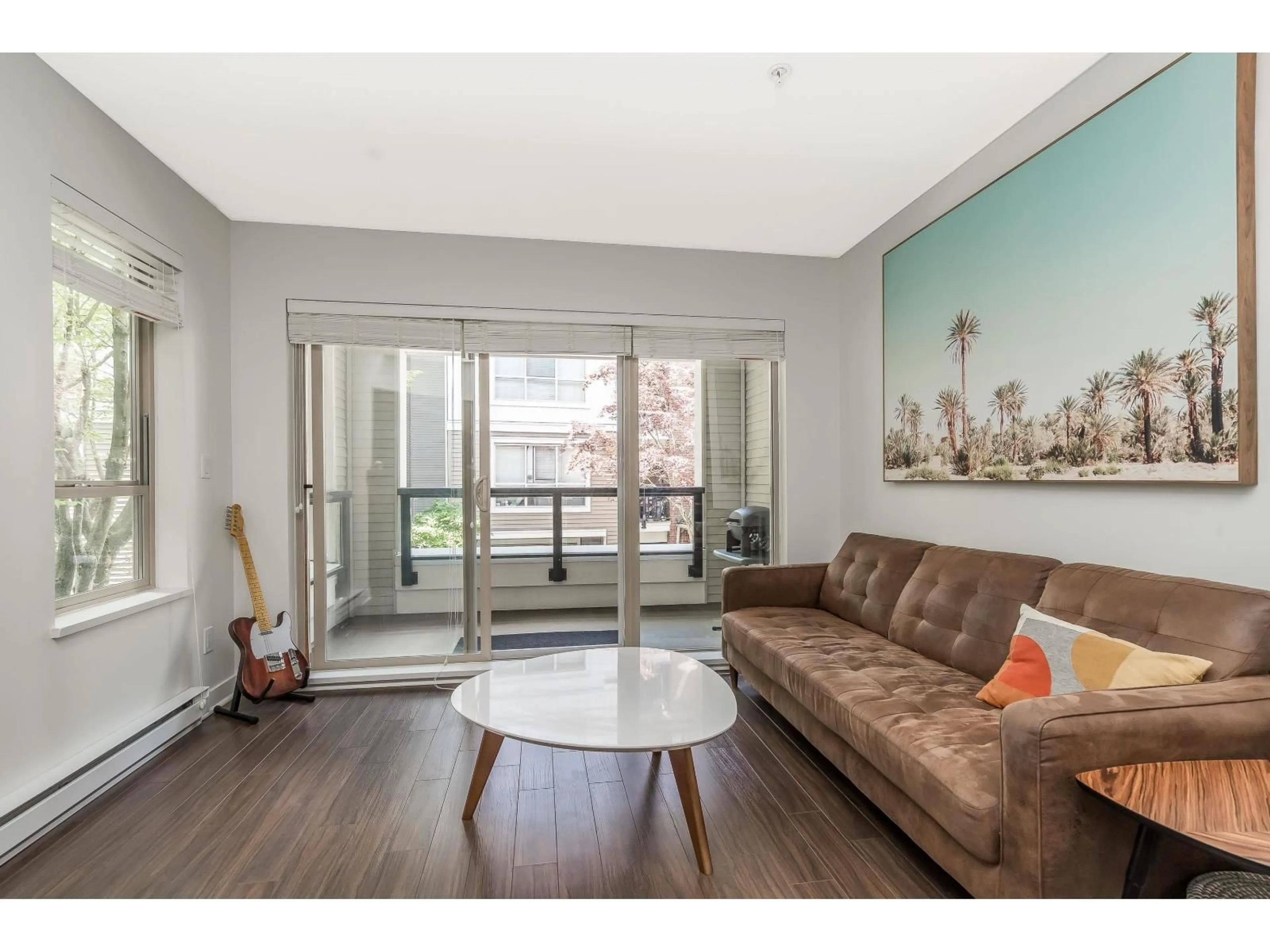 Living room with furniture, wood/laminate floor for A218 - 8929 202 STREET, Langley British Columbia V1M0B4