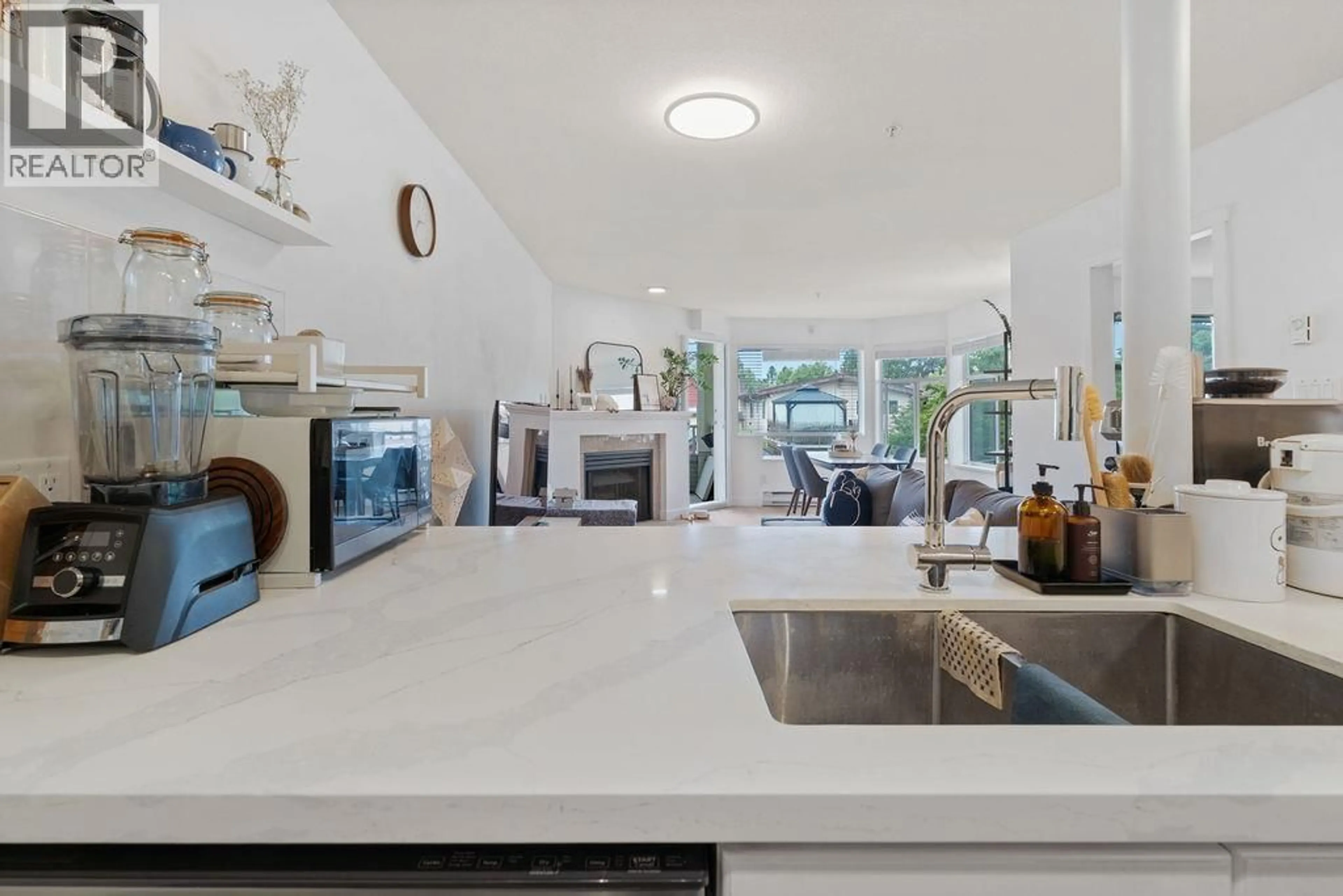 Open concept kitchen, ceramic/tile floor for 211 - 3628 RAE AVENUE, Vancouver British Columbia V5R2P5