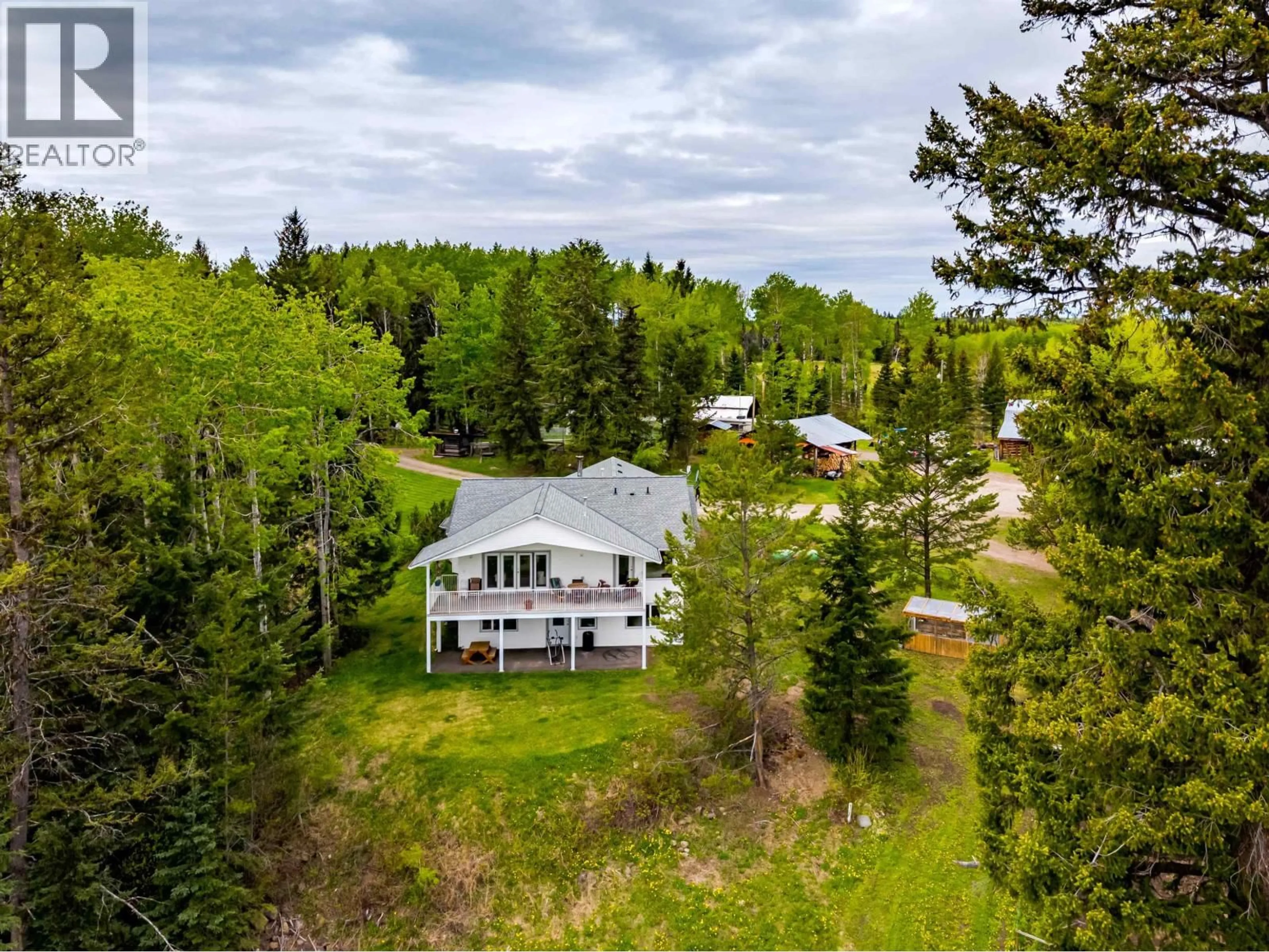 A pic from outside/outdoor area/front of a property/back of a property/a pic from drone, forest/trees view for 7497 LITTLE FORT 24 HIGHWAY, Bridge Lake British Columbia V0K1X2