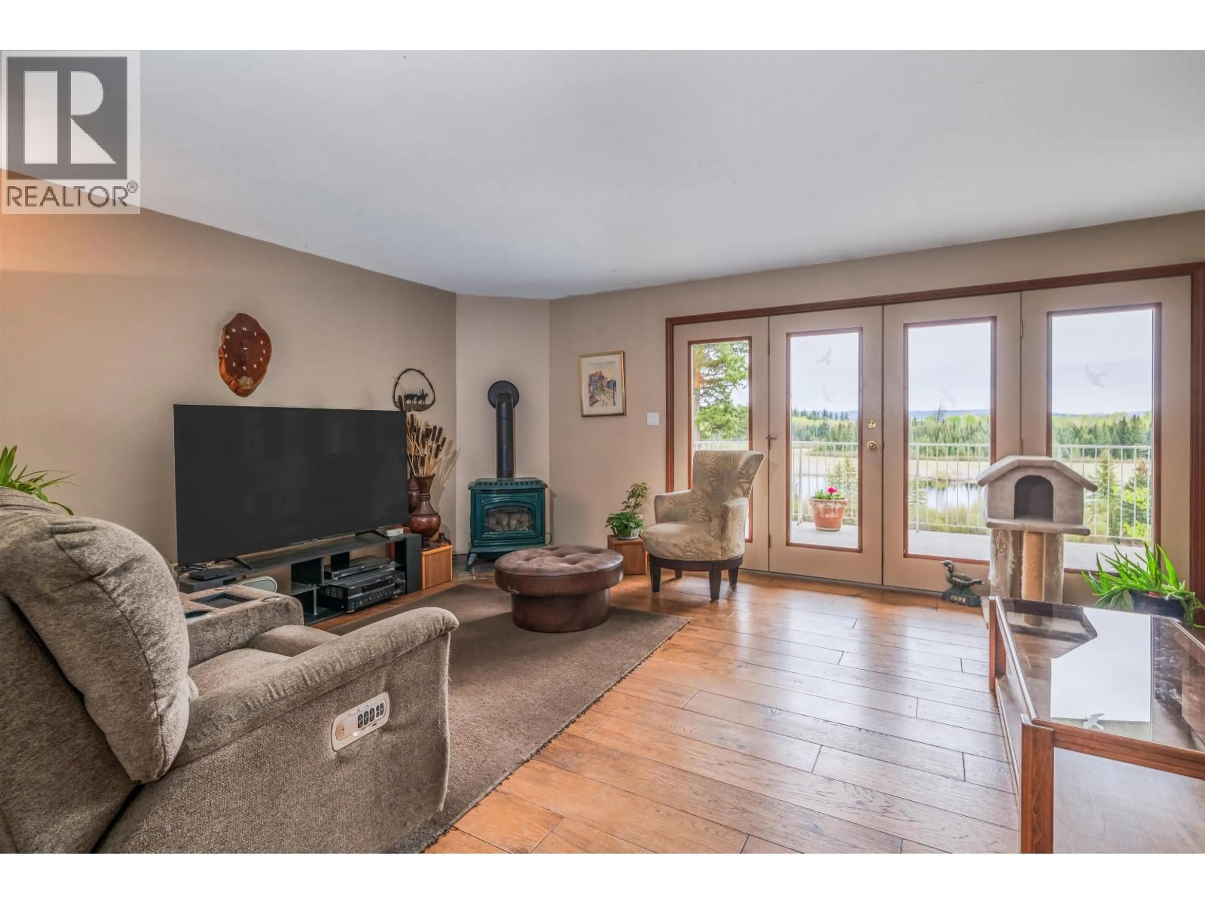 Living room with furniture, unknown for 7497 LITTLE FORT 24 HIGHWAY, Bridge Lake British Columbia V0K1X2