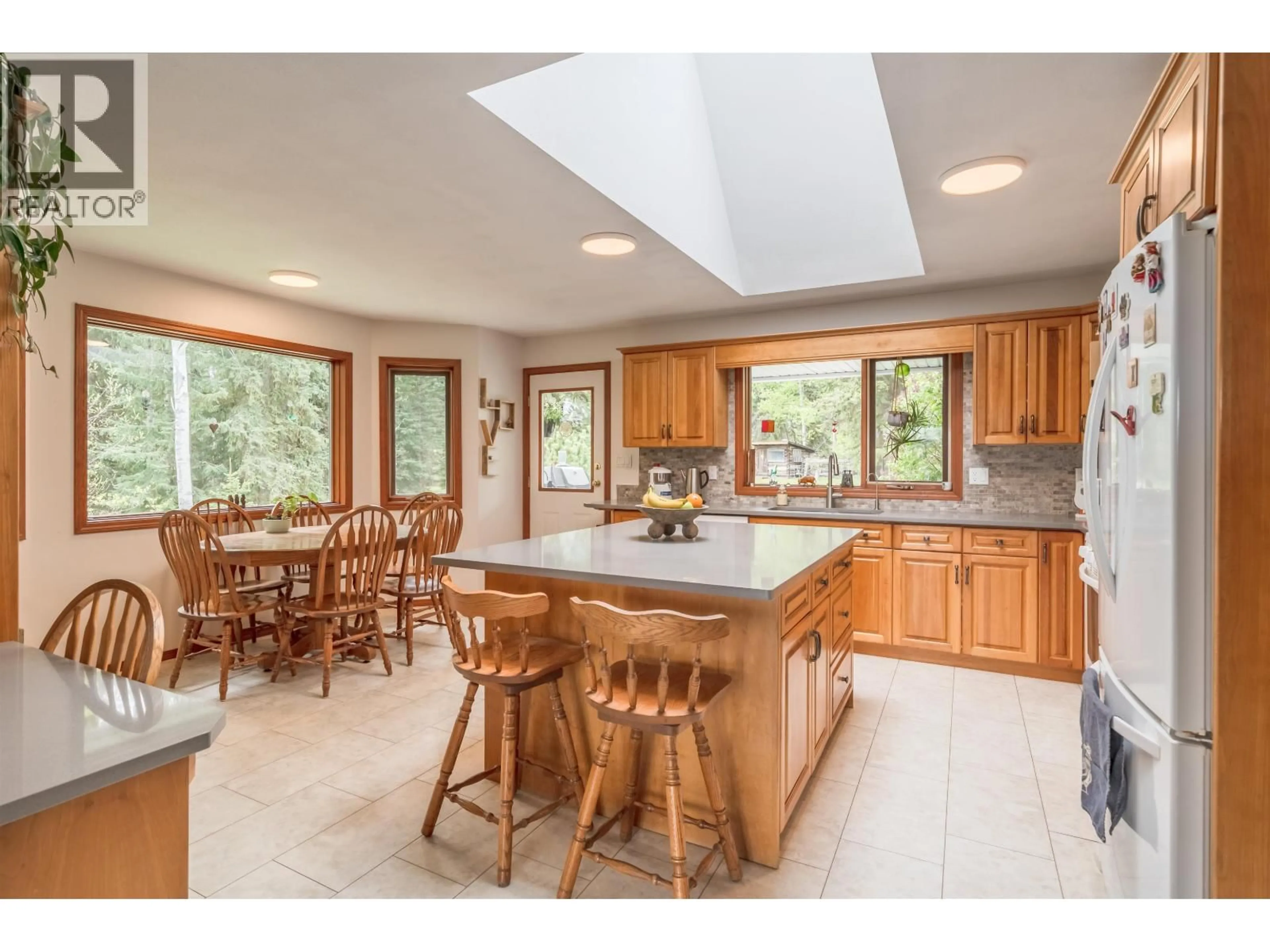 Open concept kitchen, ceramic/tile floor for 7497 LITTLE FORT 24 HIGHWAY, Bridge Lake British Columbia V0K1X2