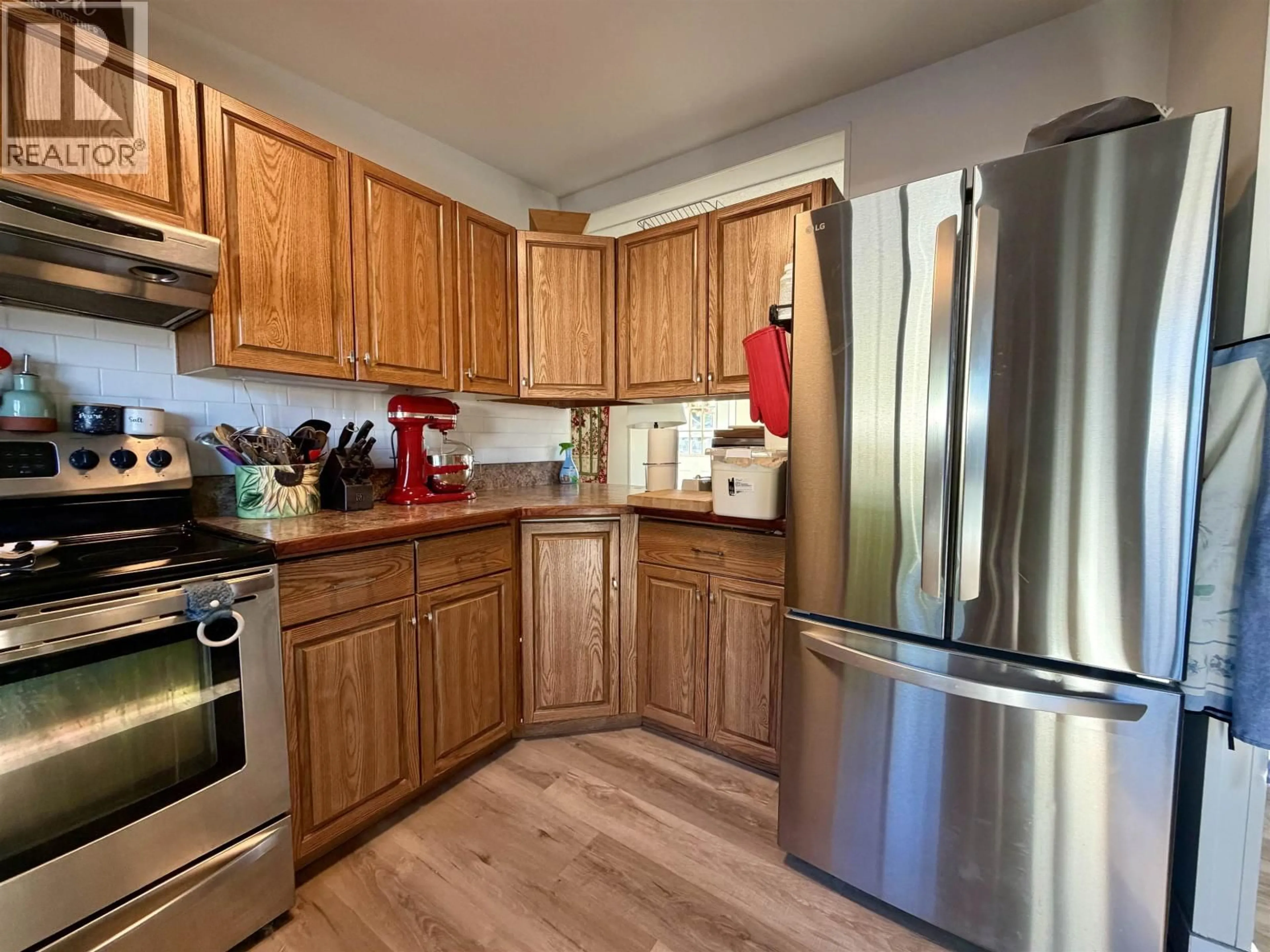 Standard kitchen, wood/laminate floor for 7360 DAWSON ROAD, Prince George British Columbia V2K5B5