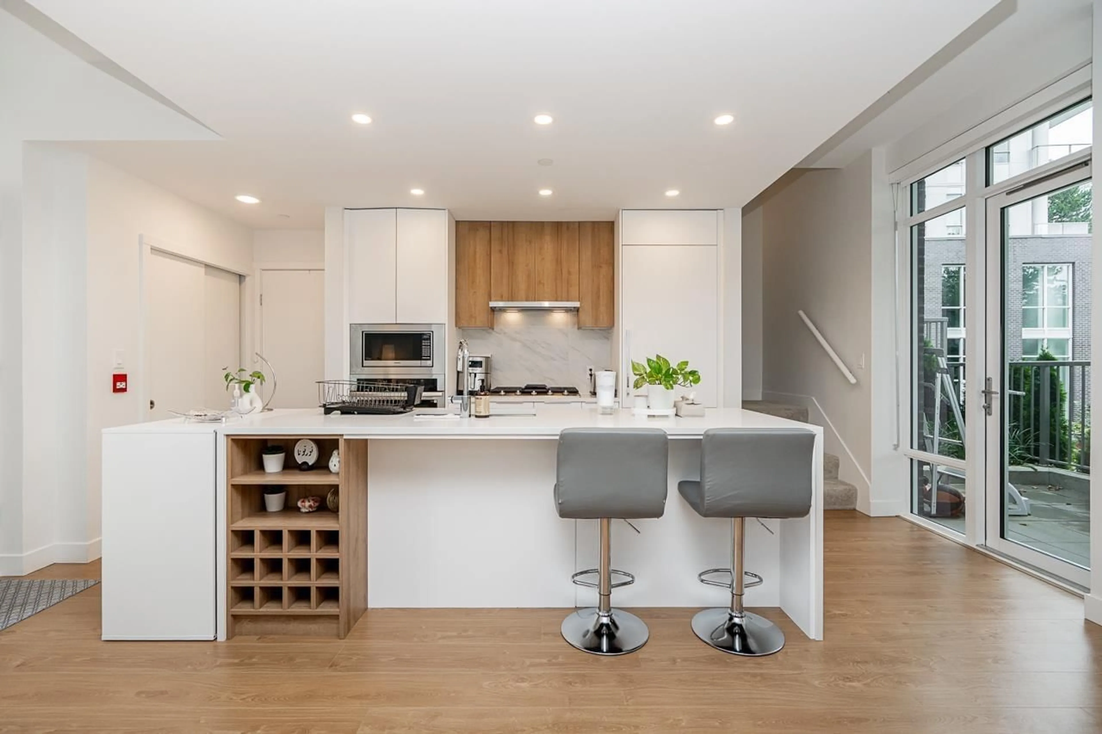 Open concept kitchen, wood/laminate floor for TH1 - 13387 OLD YALE RD ROAD, Surrey British Columbia V3T0V6