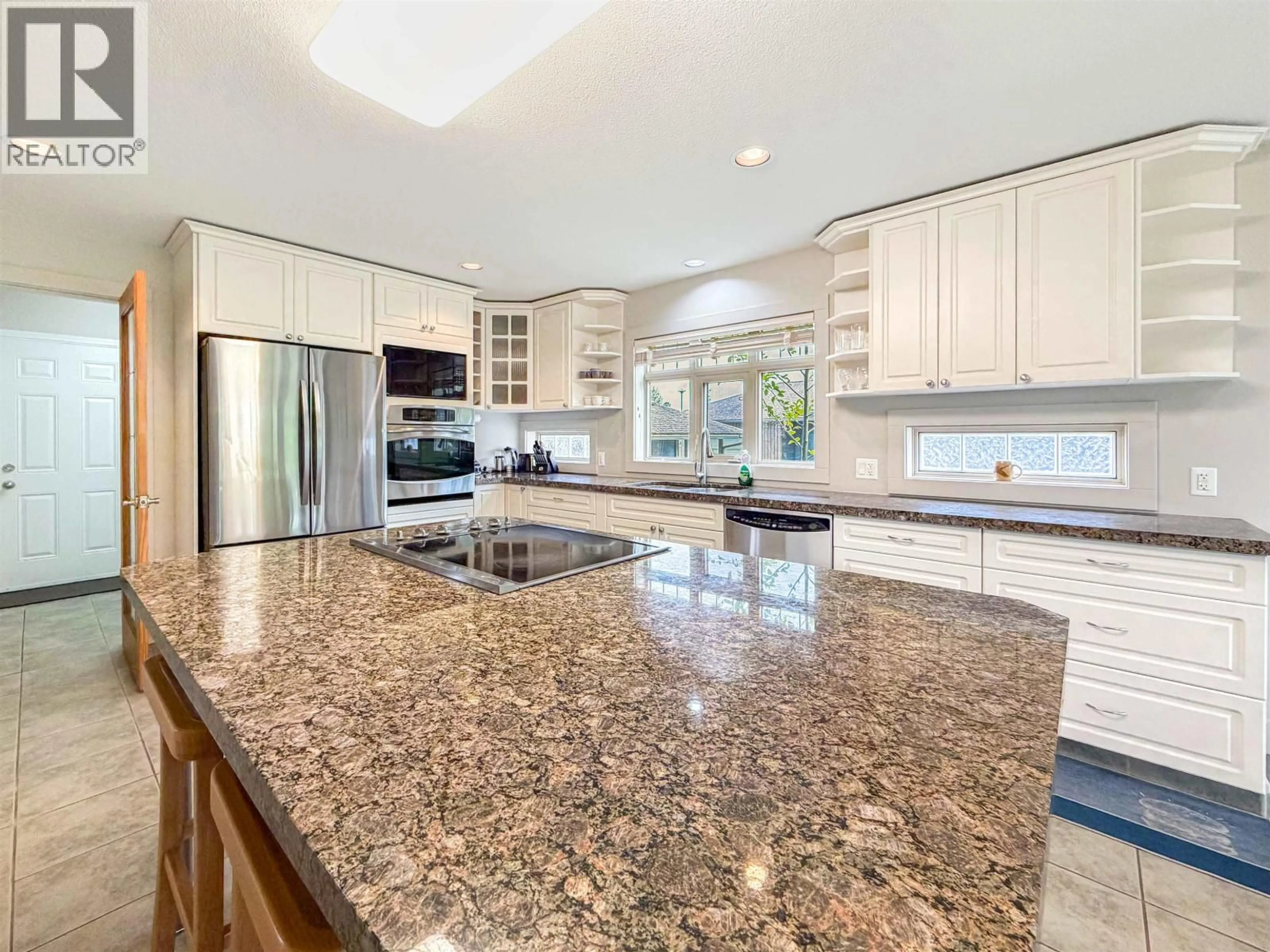 Open concept kitchen, ceramic/tile floor for 62 WAKITA AVENUE, Kitimat British Columbia V8C2S2