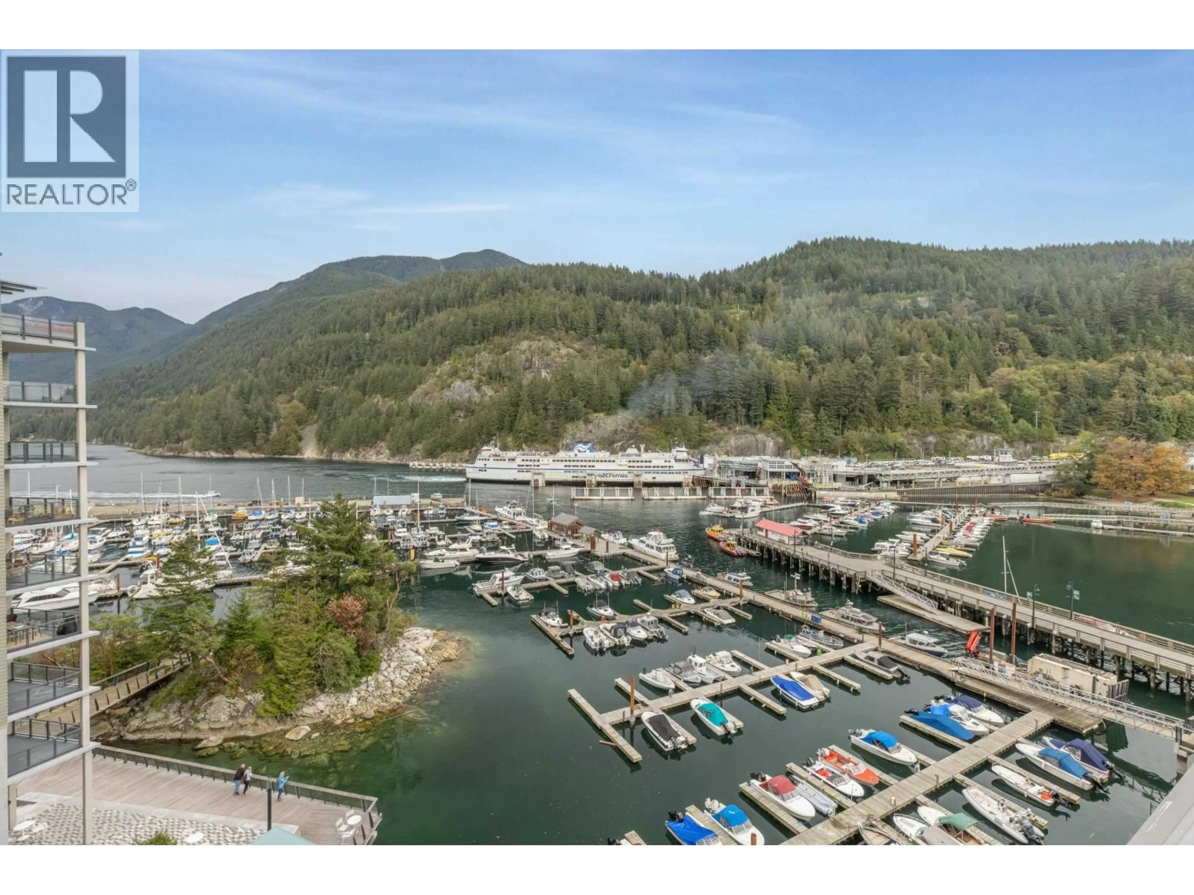 A pic from outside/outdoor area/front of a property/back of a property/a pic from drone, water/lake/river/ocean view for 706 - 6707 NELSON AVENUE, West Vancouver British Columbia V7W0A4