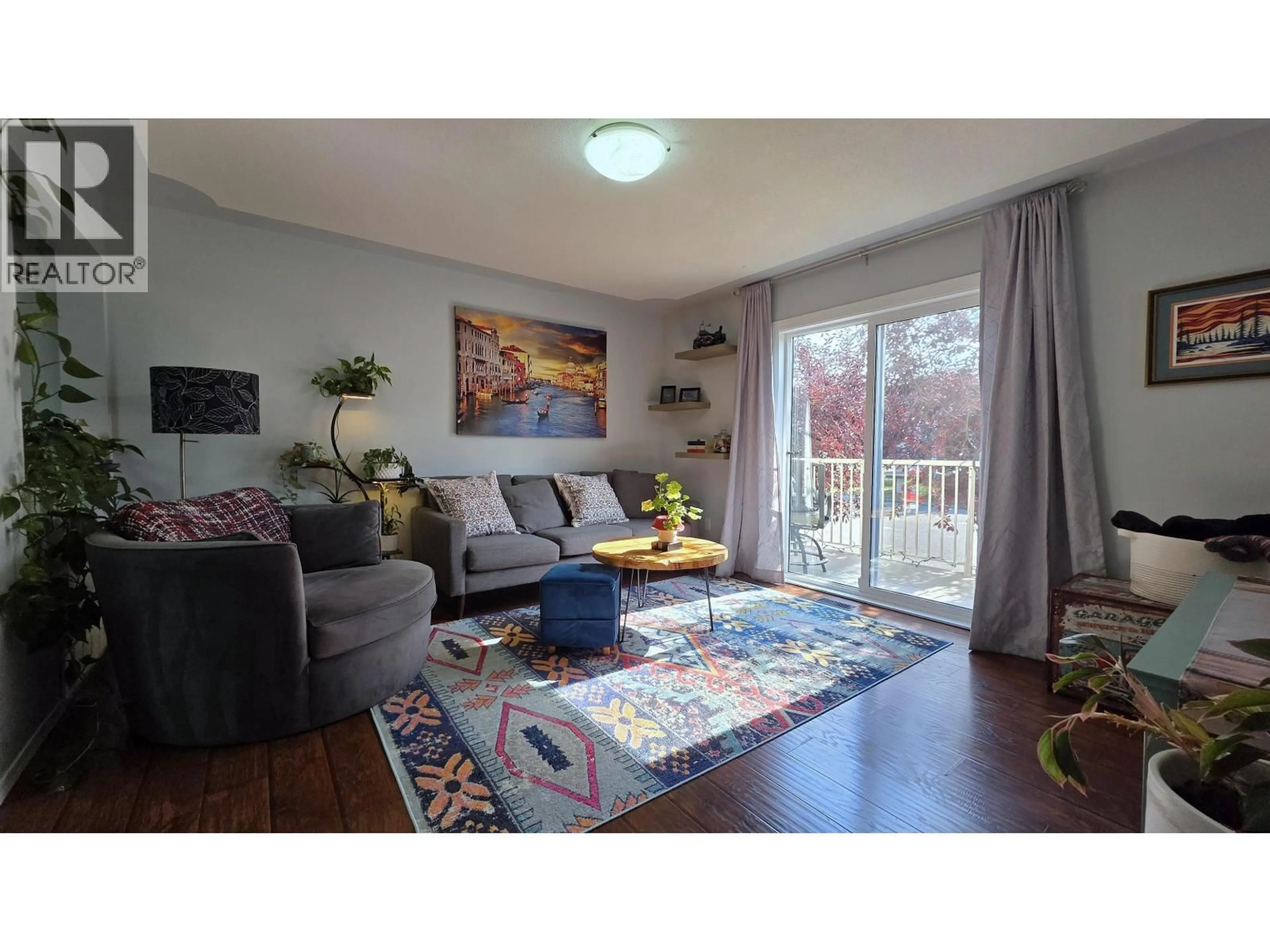 Living room with furniture, wood/laminate floor for 110 - 4025 22ND AVENUE, Prince George British Columbia V2N4Y9