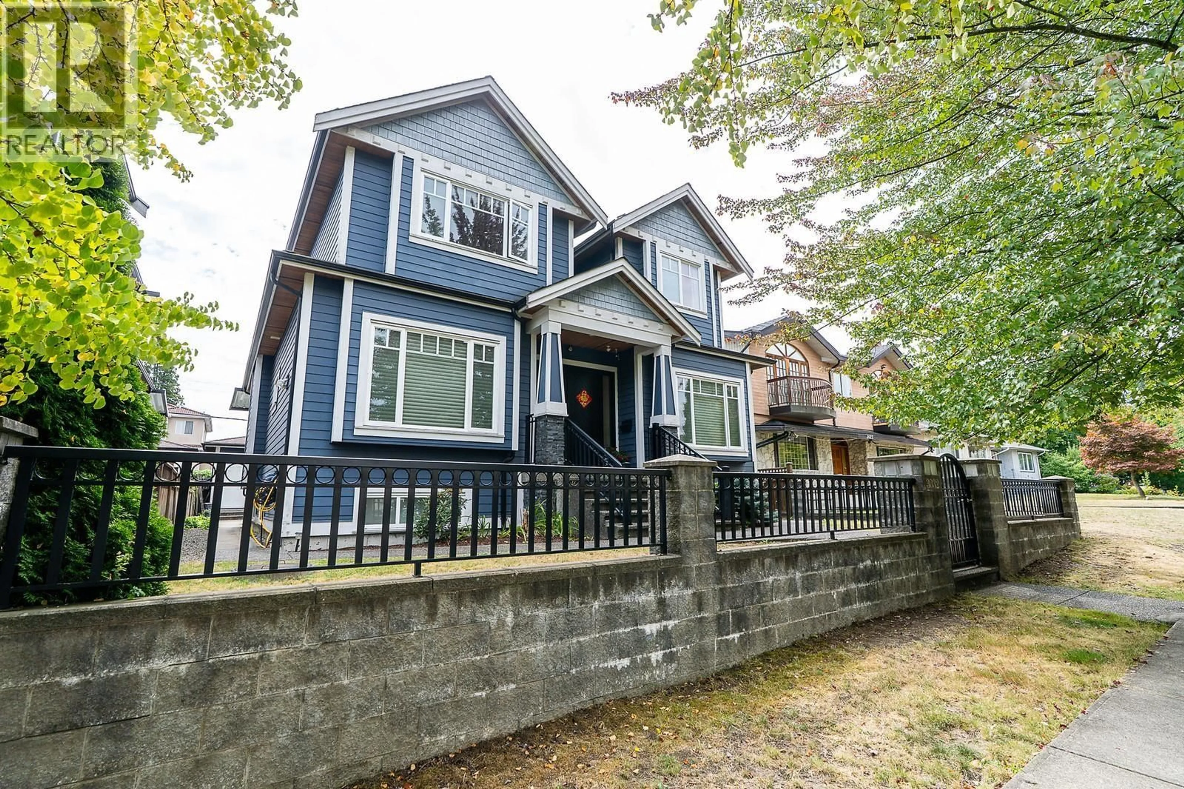 Home with vinyl exterior material, street for 3032 16TH AVENUE, Vancouver British Columbia V5M2M5