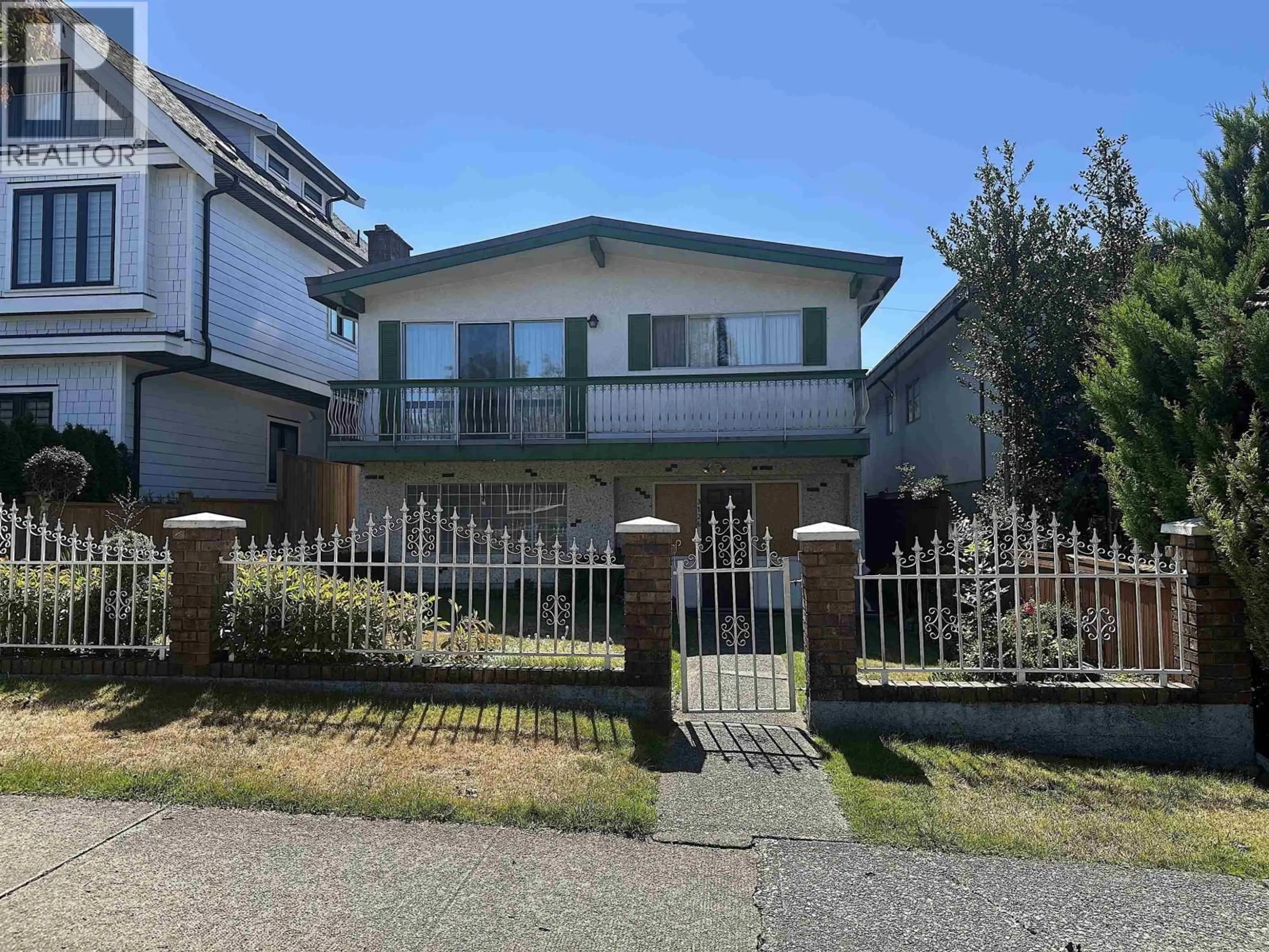 A pic from outside/outdoor area/front of a property/back of a property/a pic from drone, street for 3126 20TH AVENUE, Vancouver British Columbia V5M2V5