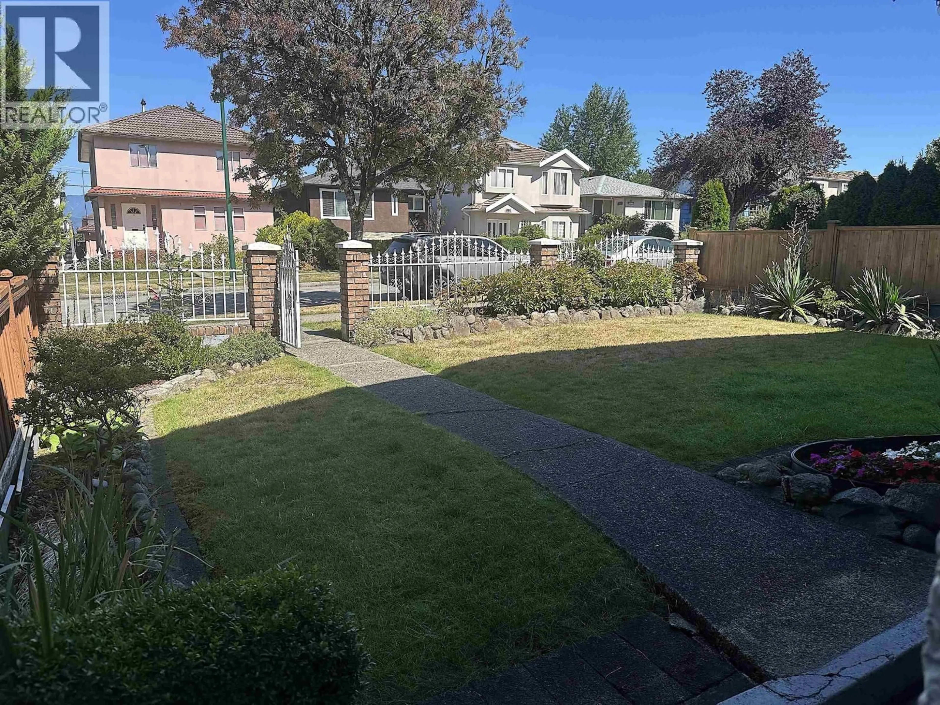 A pic from outside/outdoor area/front of a property/back of a property/a pic from drone, street for 3126 20TH AVENUE, Vancouver British Columbia V5M2V5