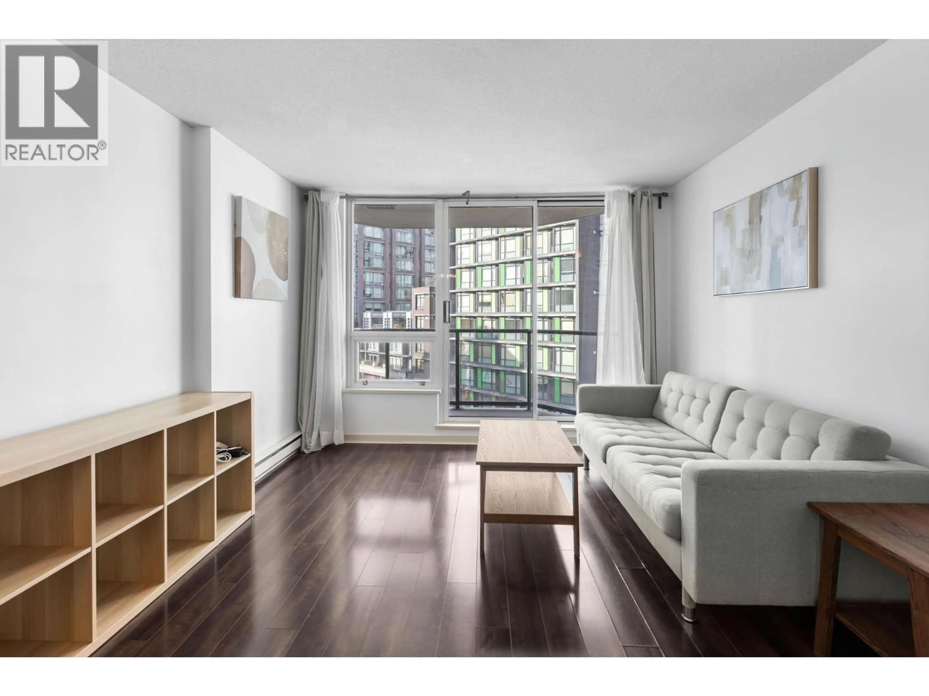 Living room with furniture, wood/laminate floor for 706 - 1212 HOWE STREET, Vancouver British Columbia V6Z2M9