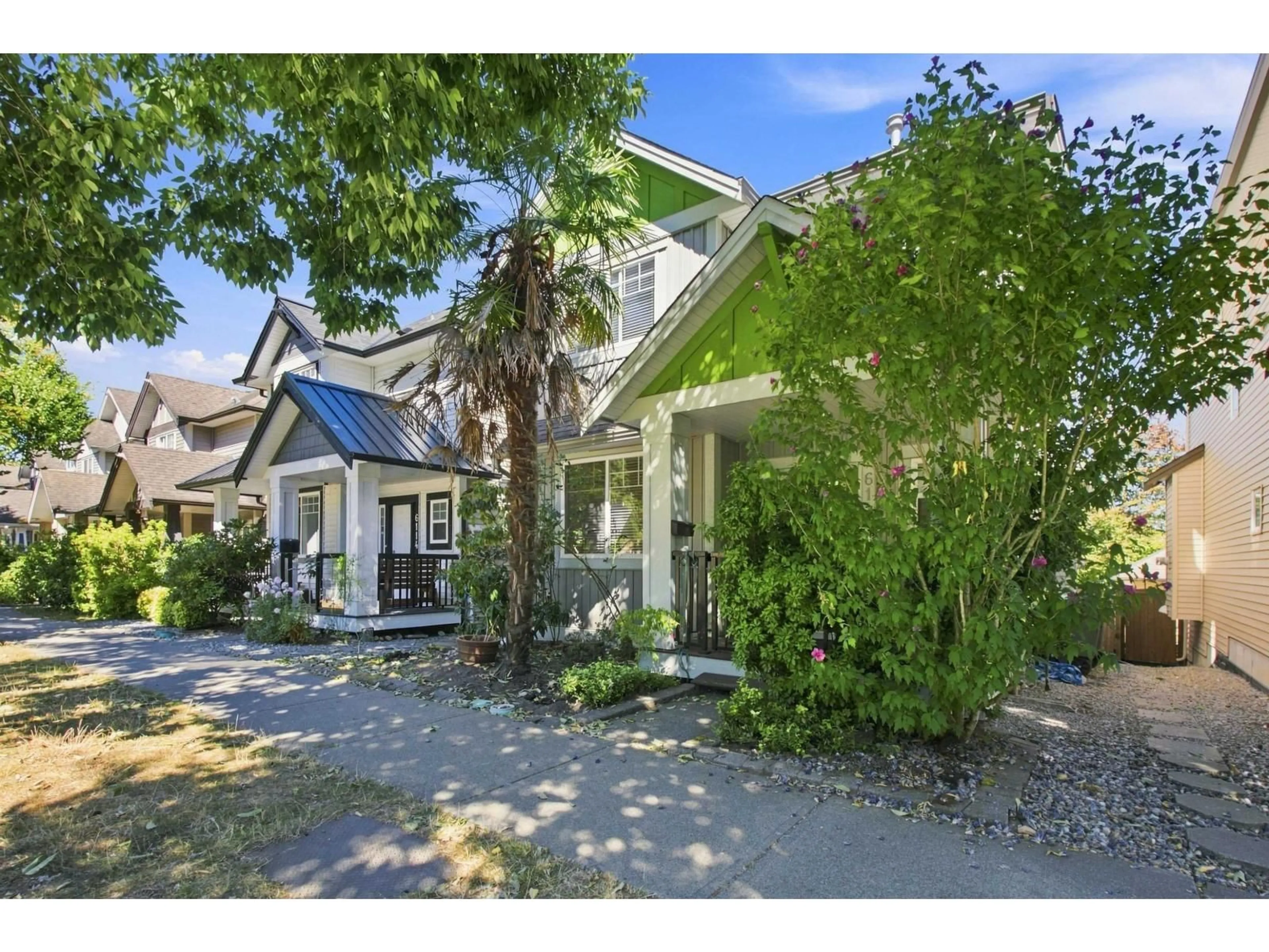 A pic from outside/outdoor area/front of a property/back of a property/a pic from drone, street for 6110 150 STREET, Surrey British Columbia V3S3H7