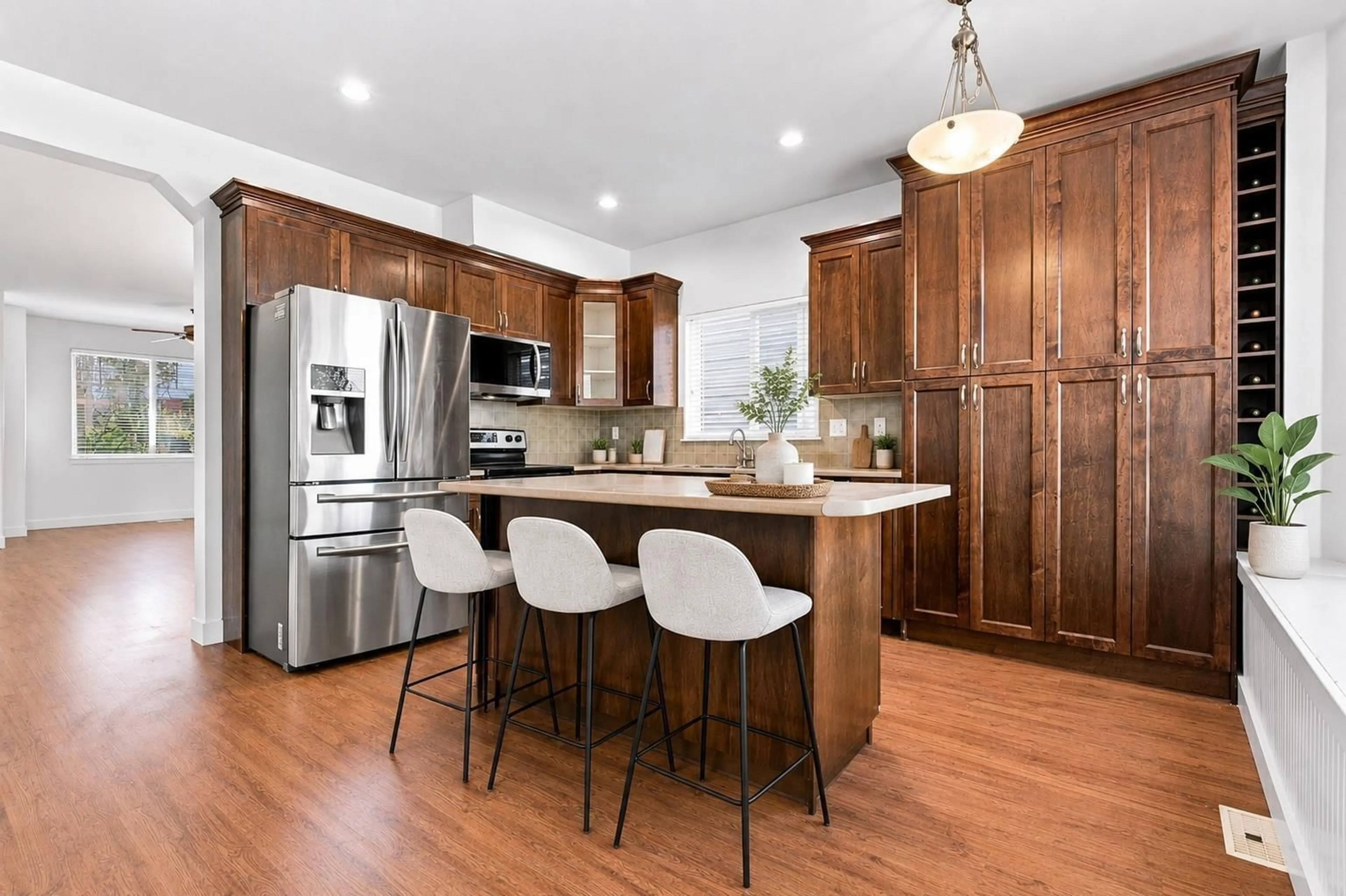 Open concept kitchen, wood/laminate floor for 6110 150 STREET, Surrey British Columbia V3S3H7