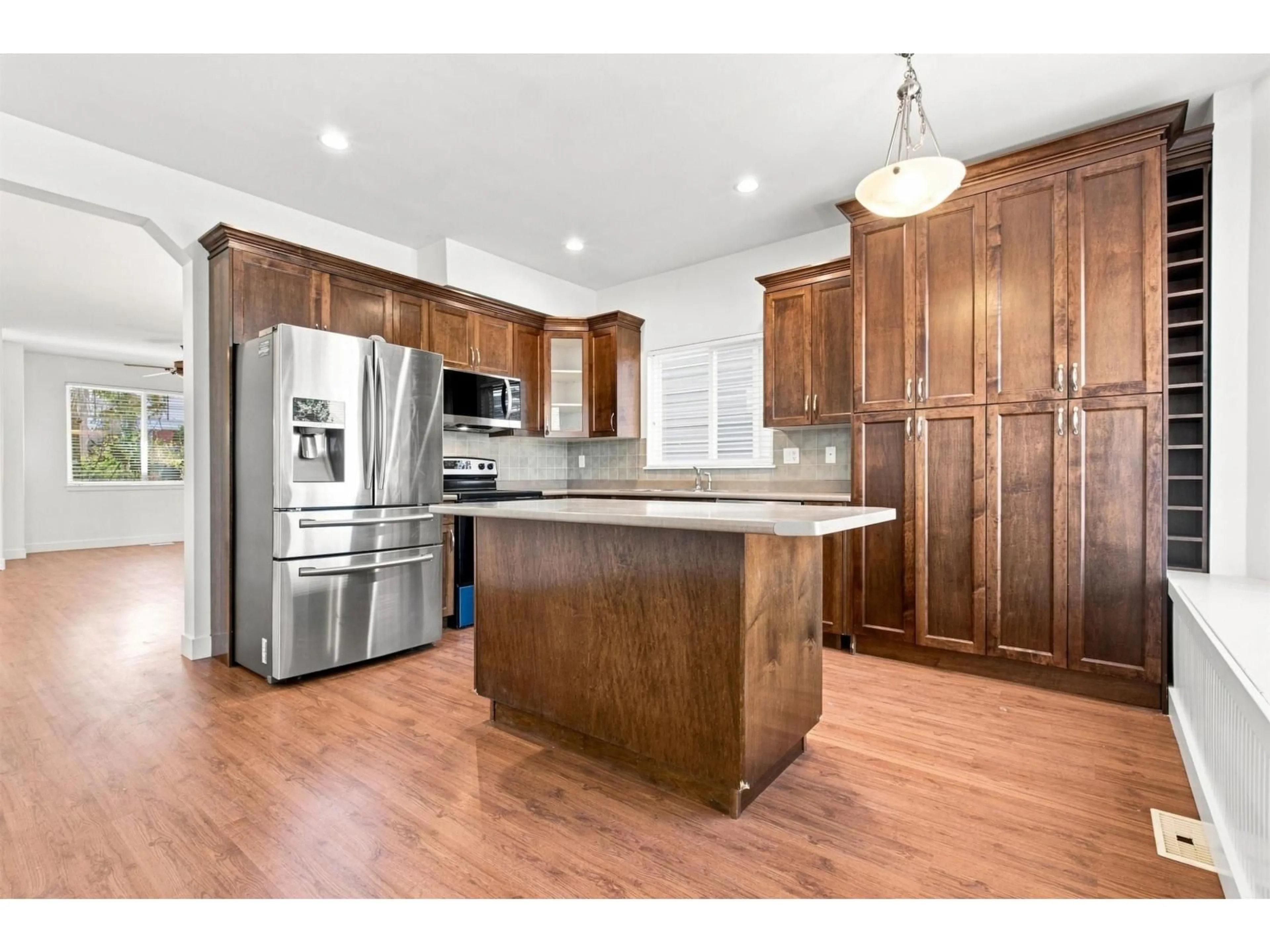 Open concept kitchen, wood/laminate floor for 6110 150 STREET, Surrey British Columbia V3S3H7
