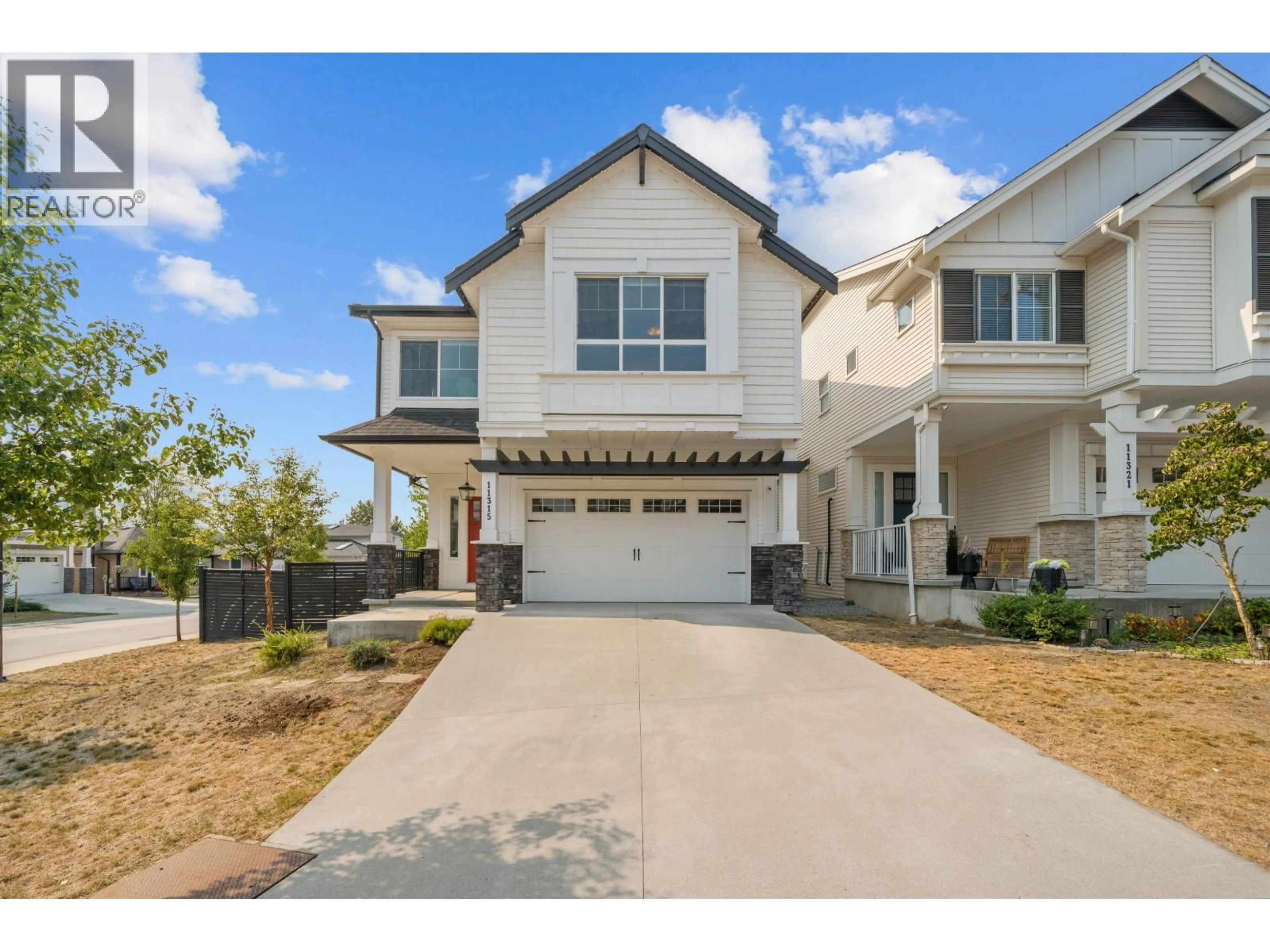 Home with vinyl exterior material, street for 11315 230 STREET, Maple Ridge British Columbia V2X9S6
