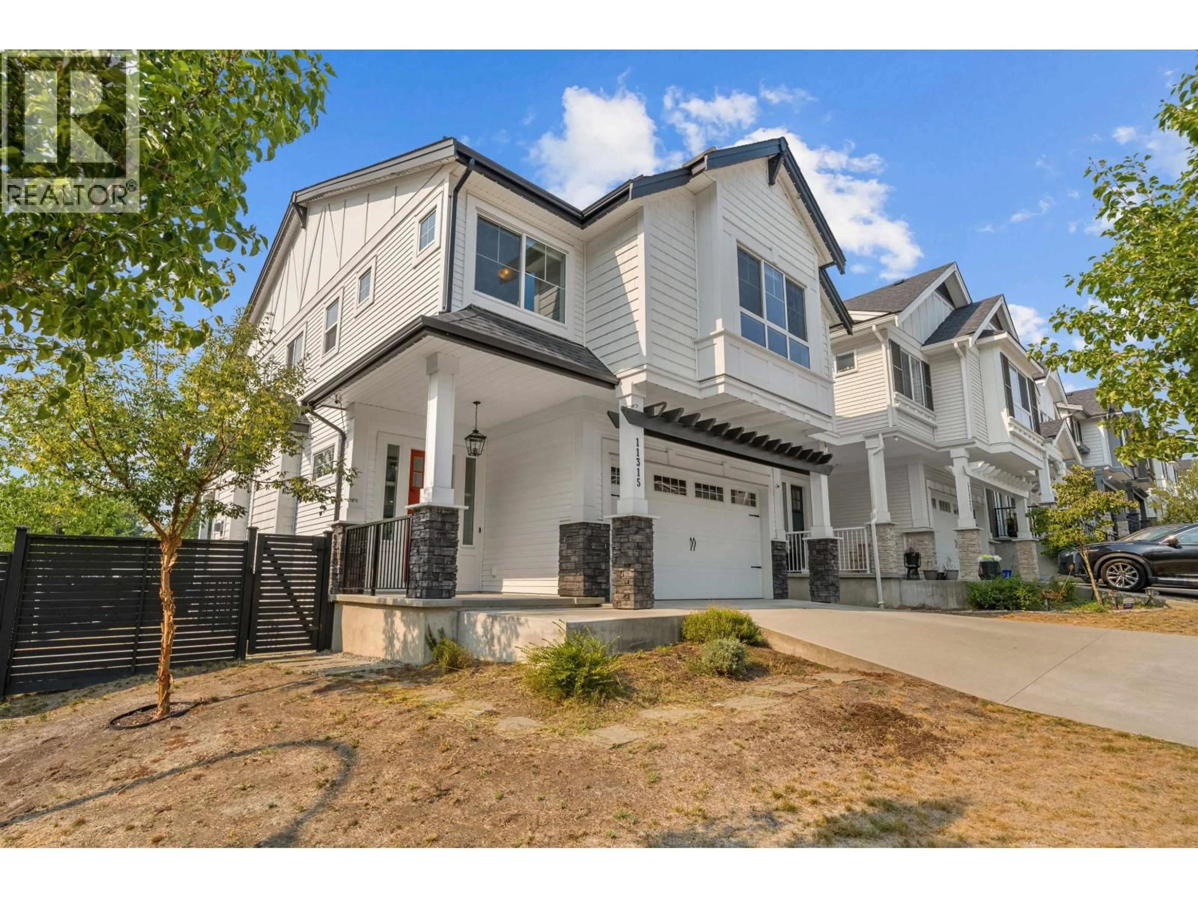 Home with vinyl exterior material, street for 11315 230 STREET, Maple Ridge British Columbia V2X9S6